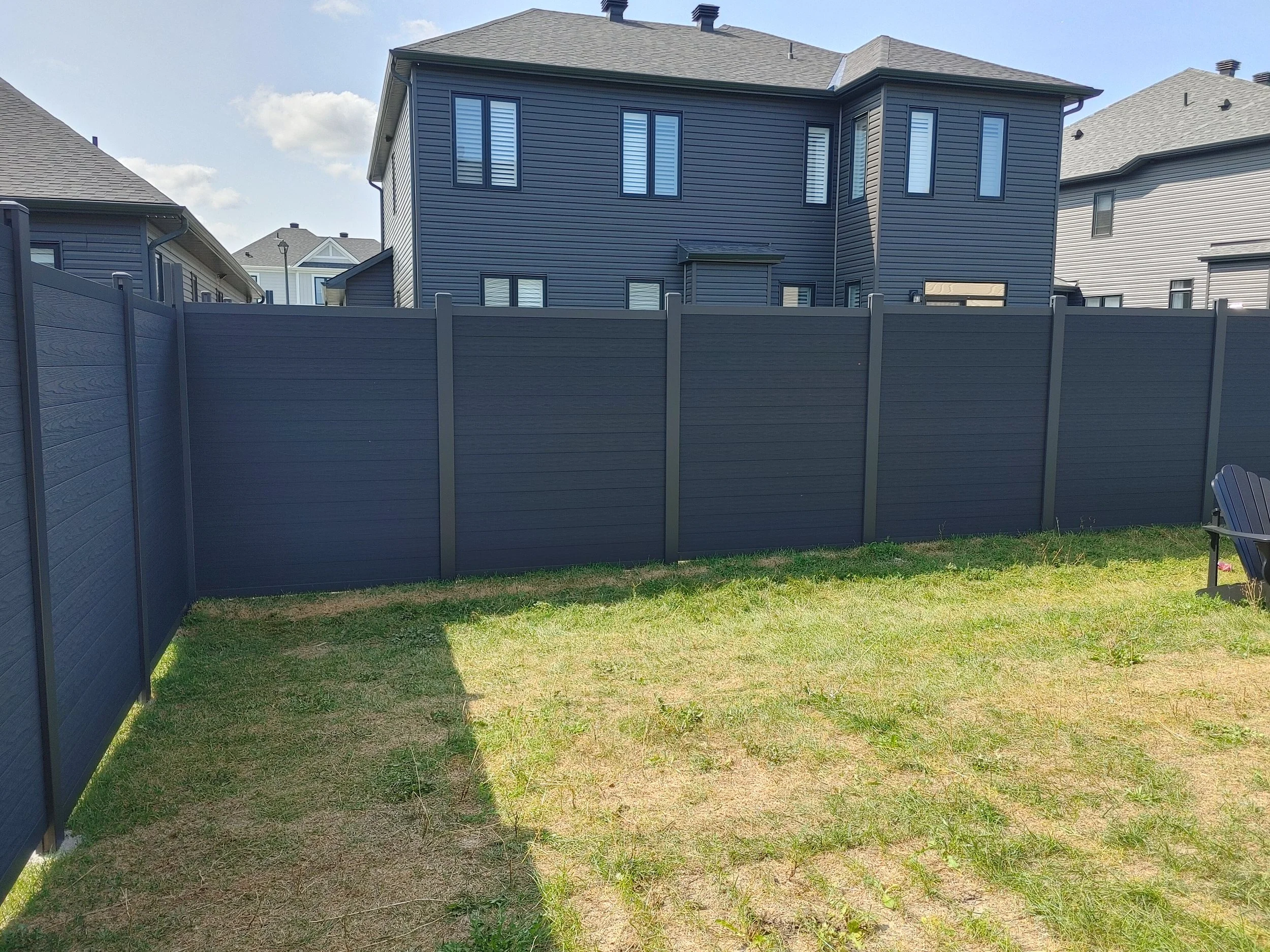 Black WPC Fence in Manotick, 2025. StandArt Fence