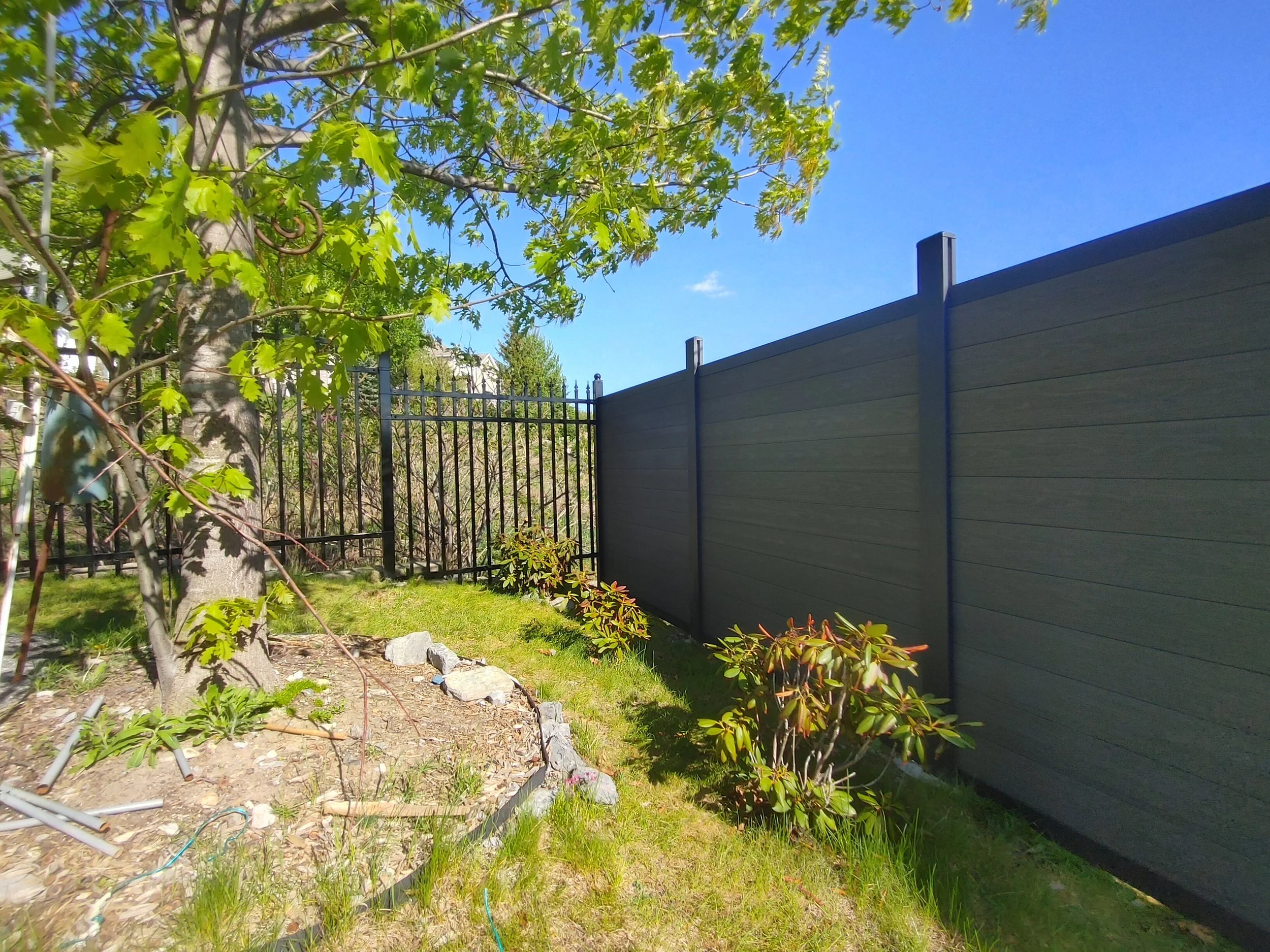 Dark Grey WPC and Iron Fence in Barrhaven, 2025. StandArt Fence 