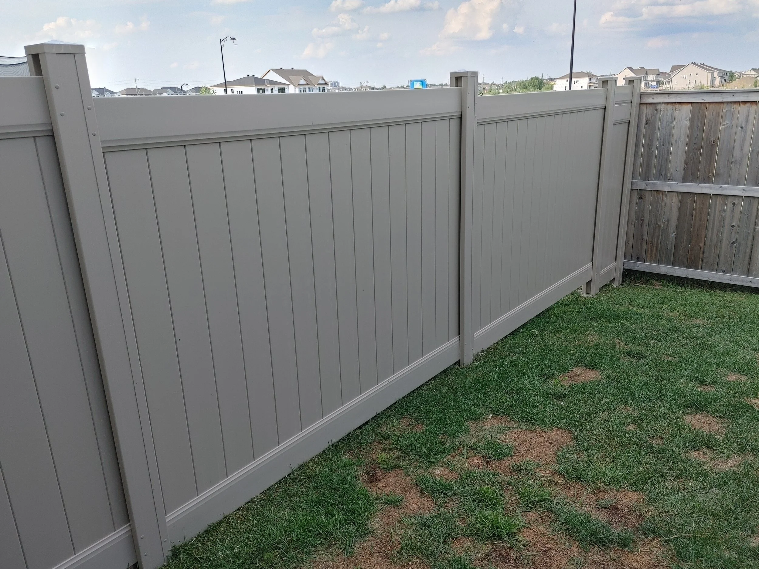 Adobe PVC Fence in Barrhaven, 2025. StandArt Fence 