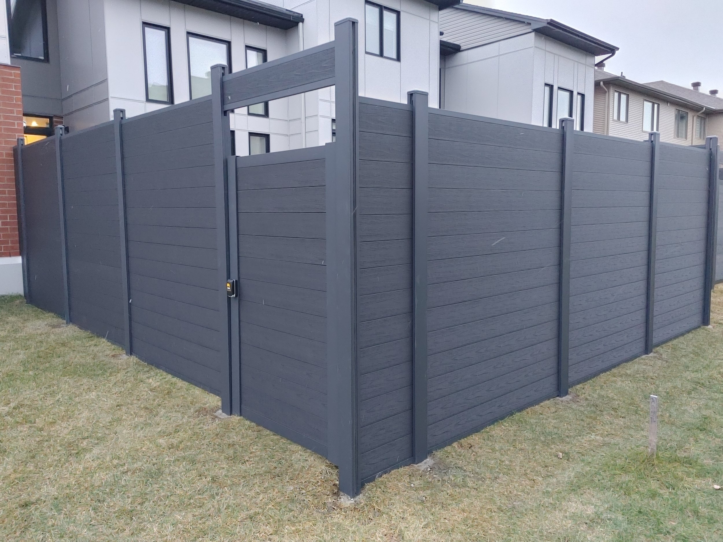 Black WPC Fence in Stittsville, 2025. StandArt Fence