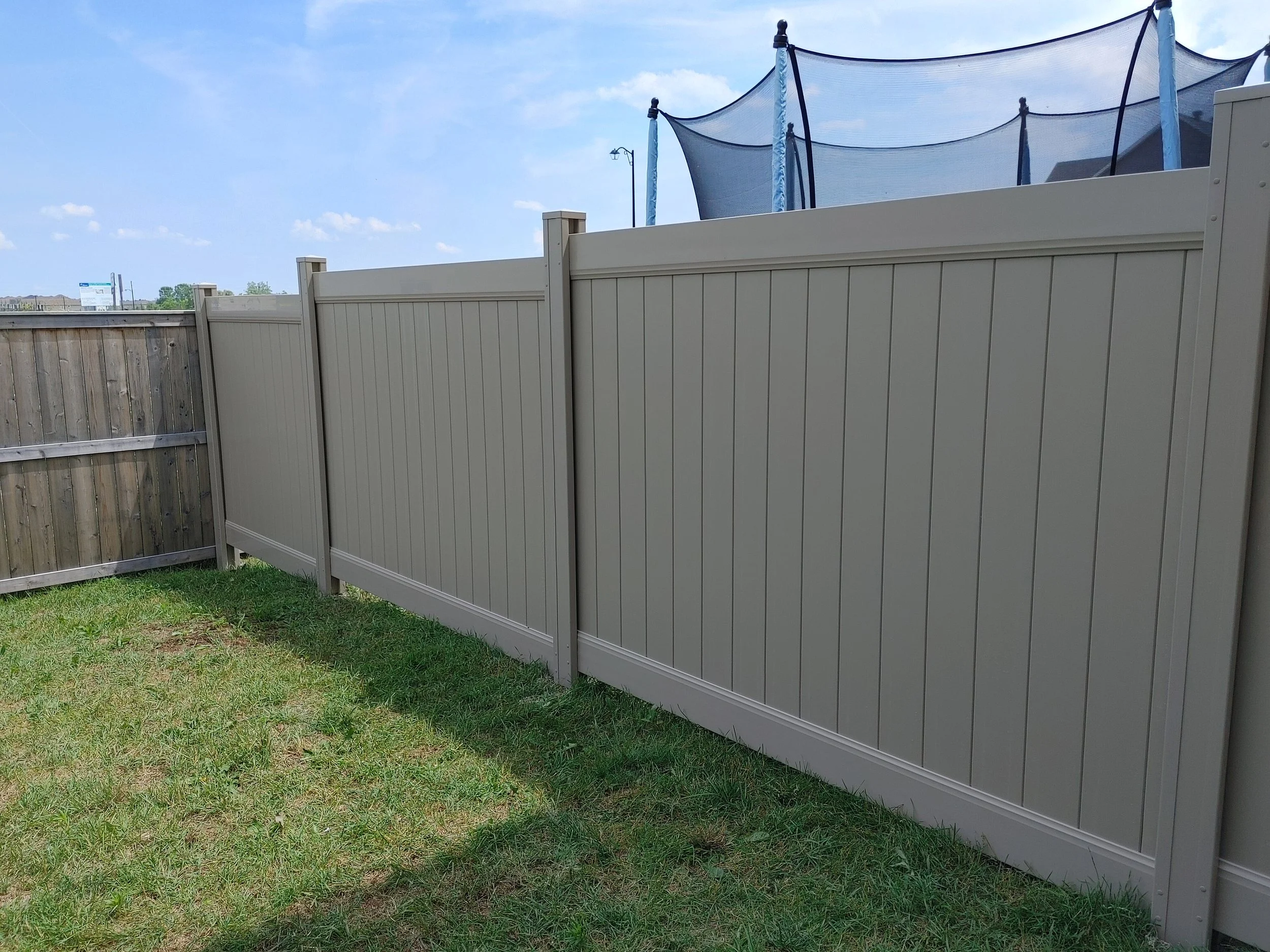 Adobe PVC Fence in Barrhaven, 2025. StandArt Fence 