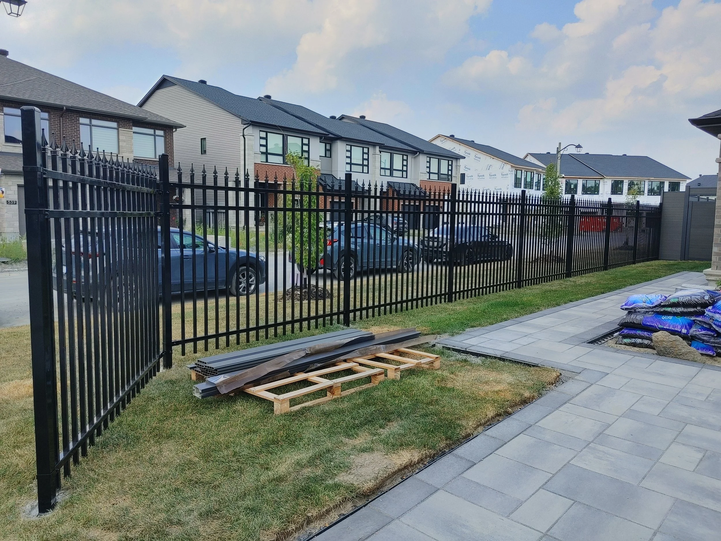 Dark Grey WPC/Iron Fence in Stittsville, 2025. StandArt Fence 