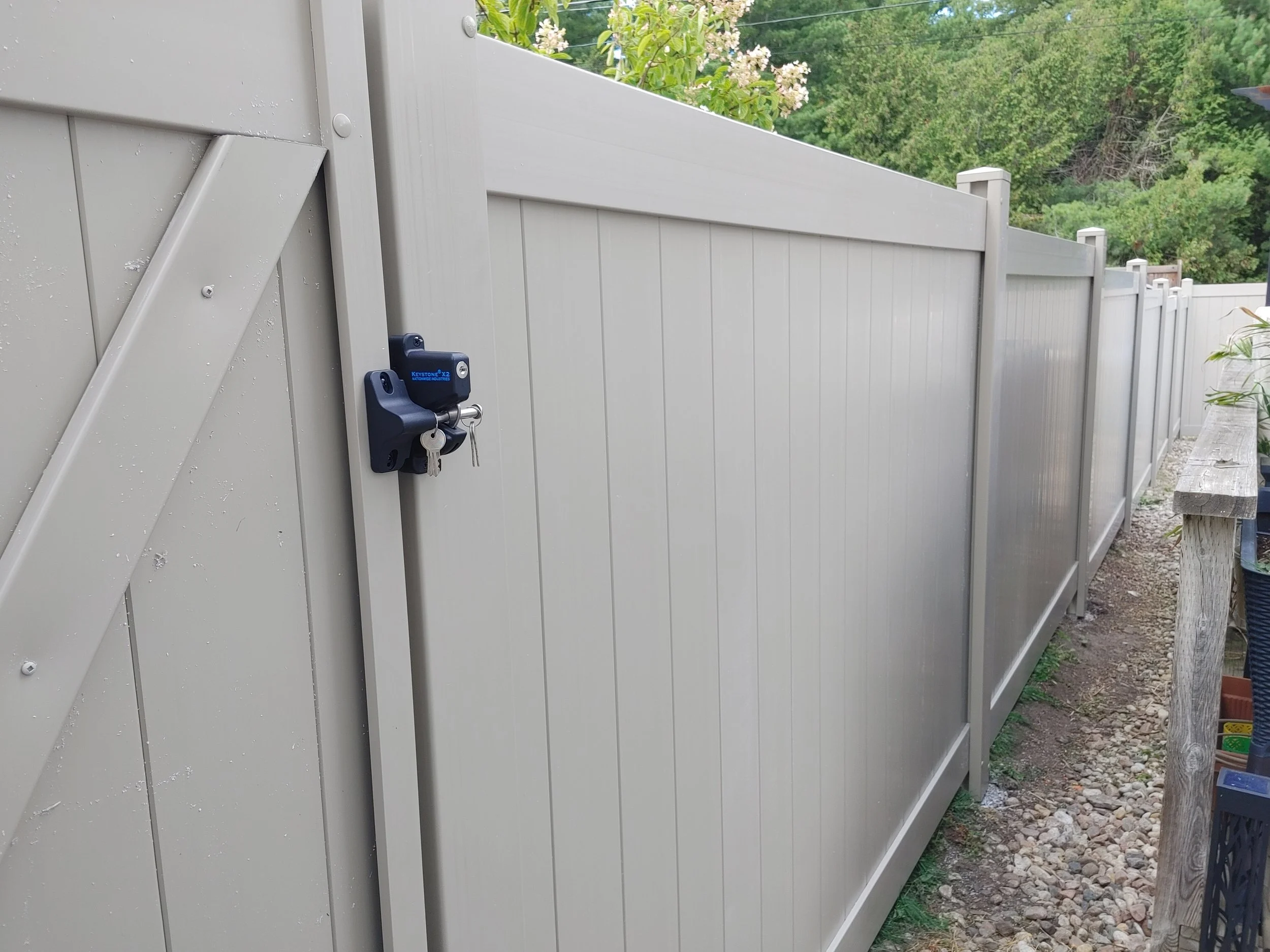 Adobe PVC Titan Fence in Stittsville, 2025. StandArt Fence