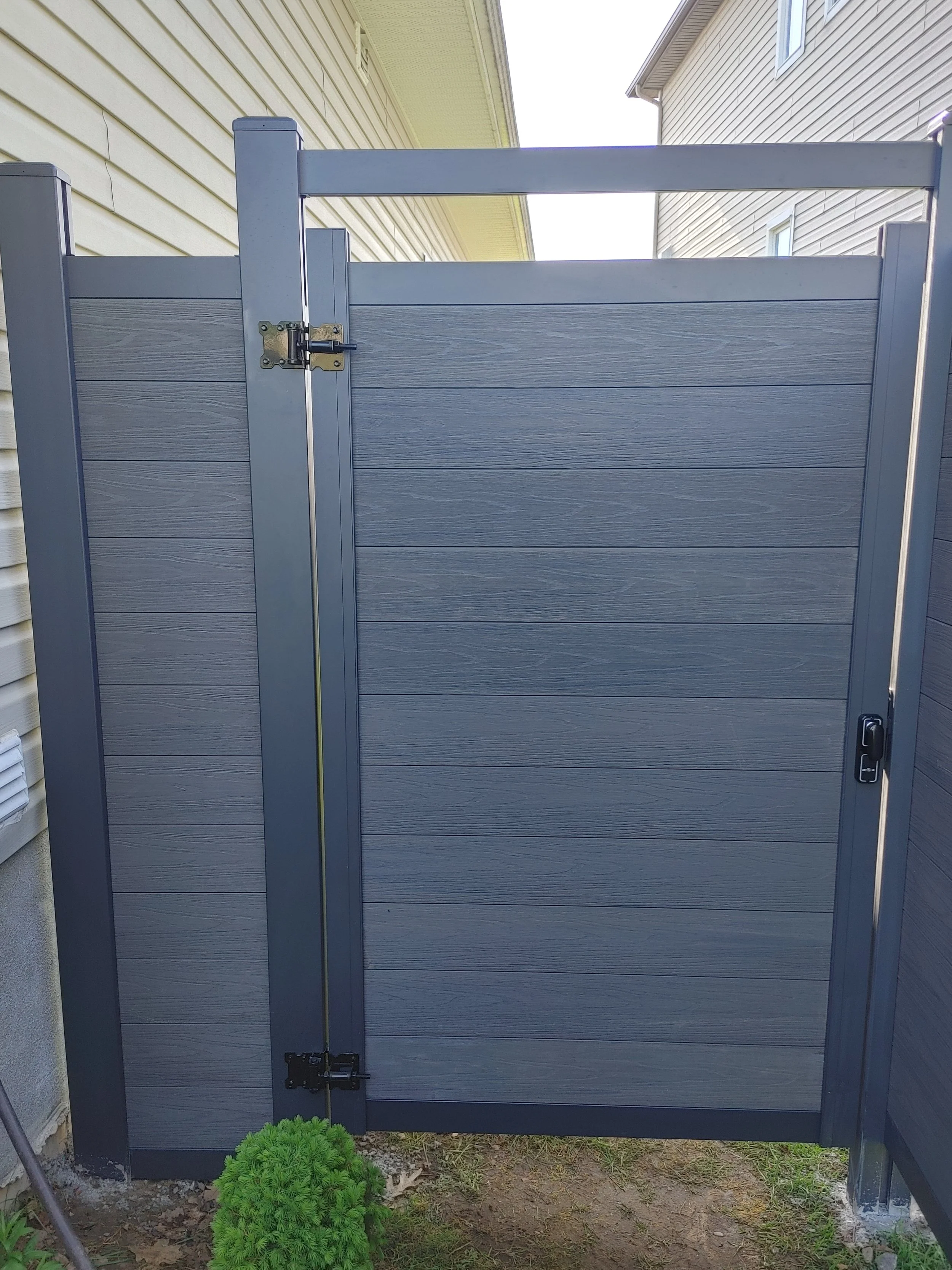 Dark Grey WPC and Iron Fence in Barrhaven, 2025. StandArt Fence 