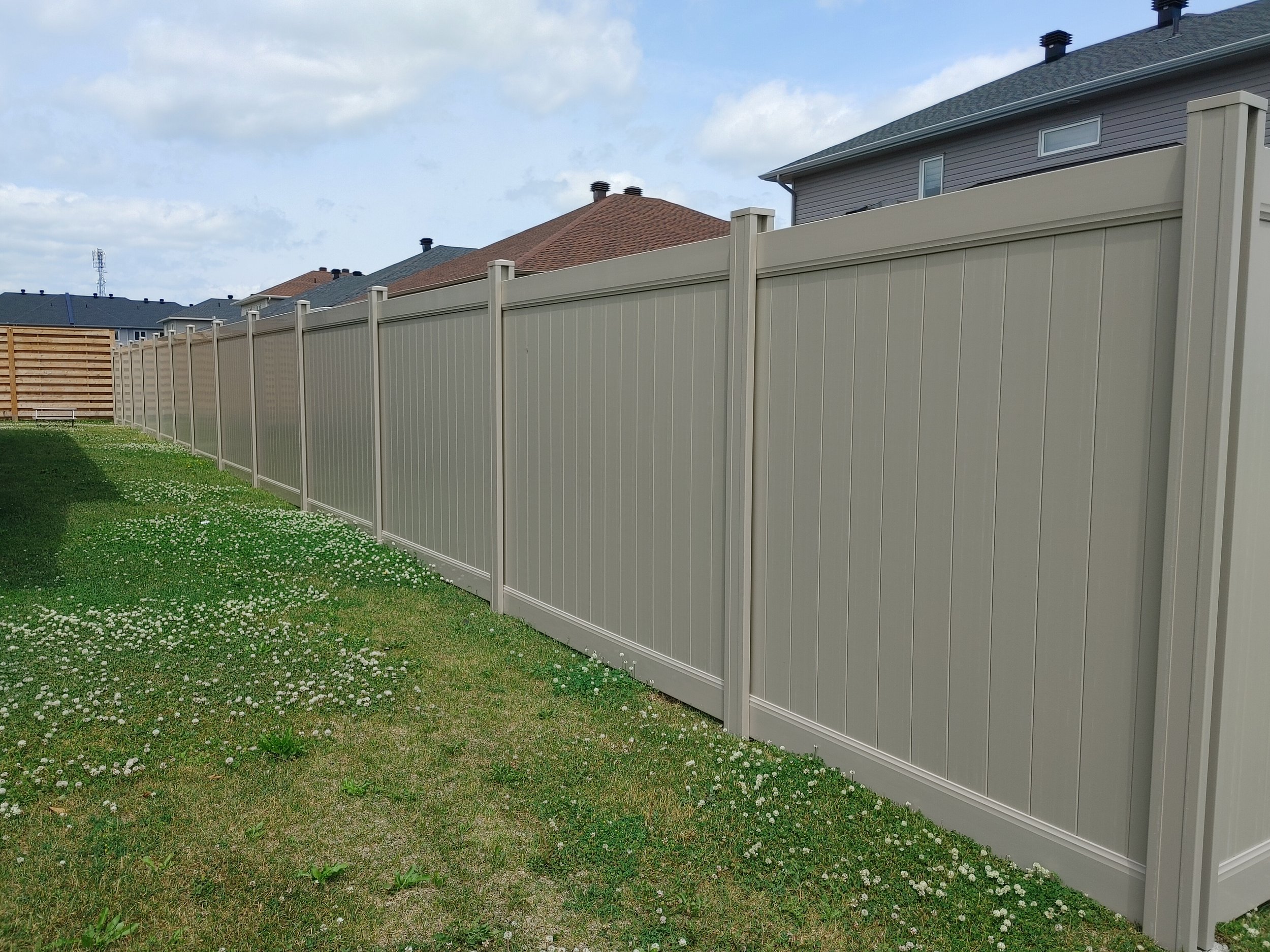 Adobe PVC Fence in Carleton Place, 2025. StandArt Fence 