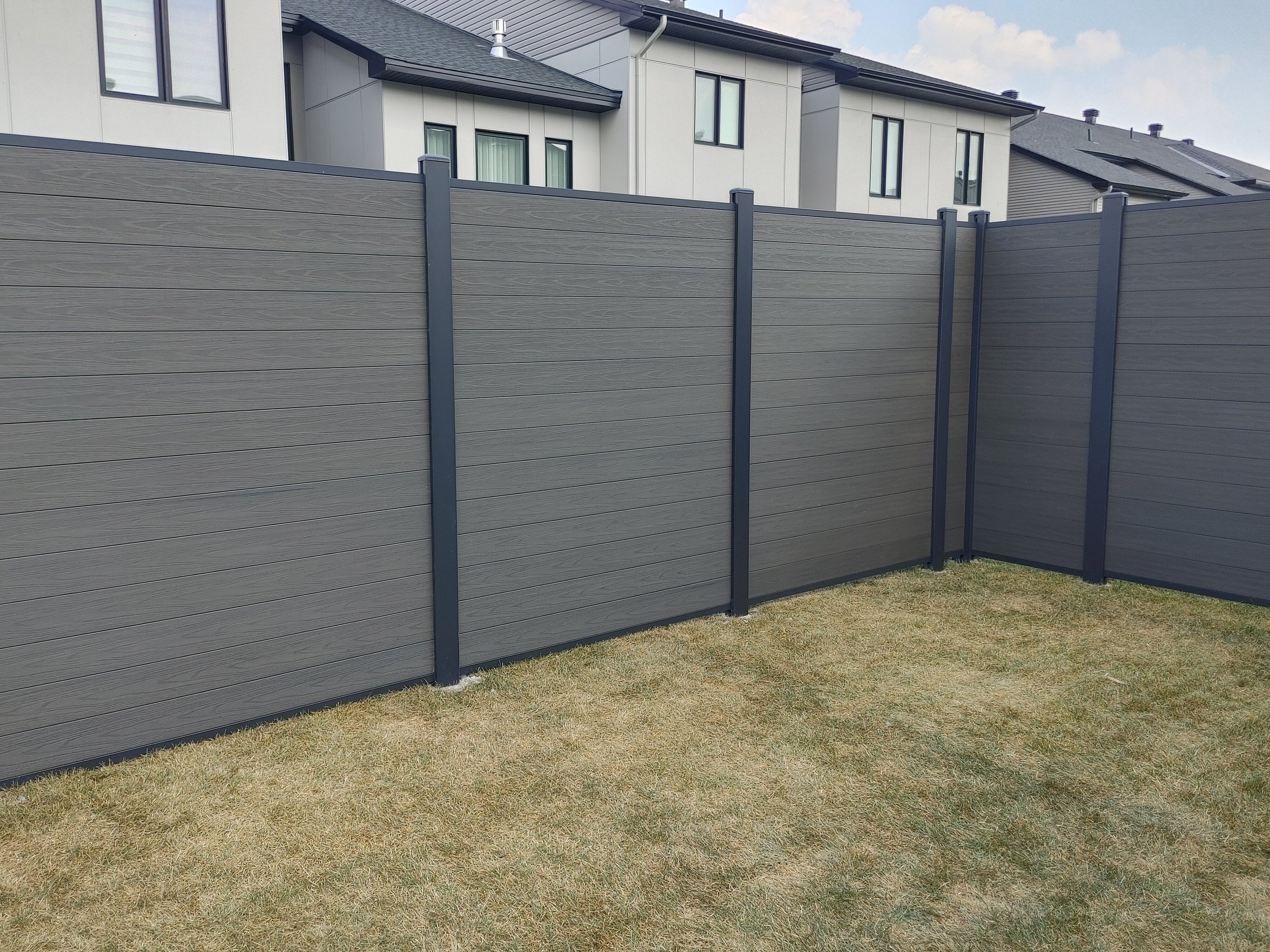 Dark Grey WPC/Iron Fence in Stittsville, 2025. StandArt Fence 