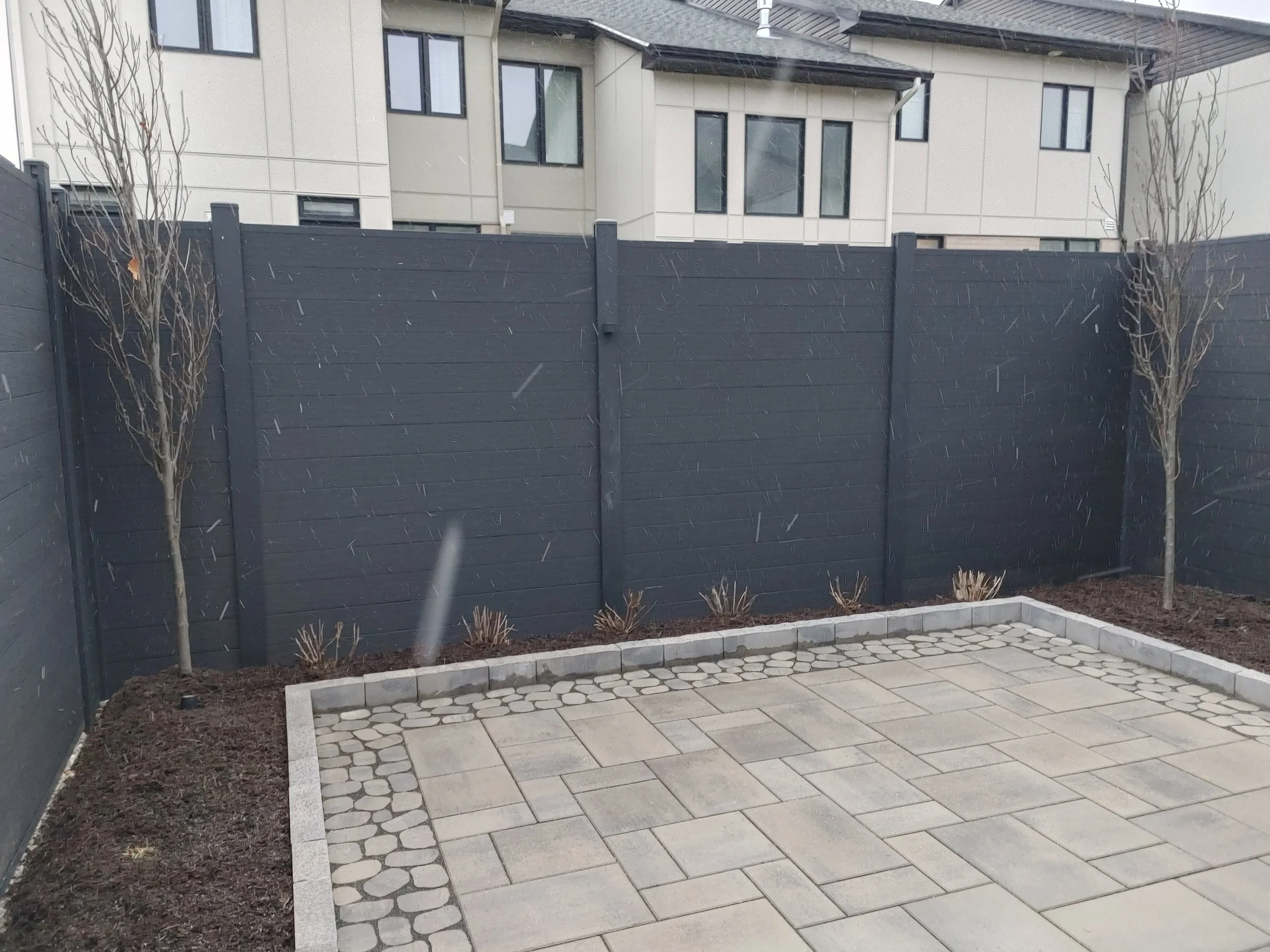 Black WPC Fence in Stittsville, 2025. StandArt Fence
