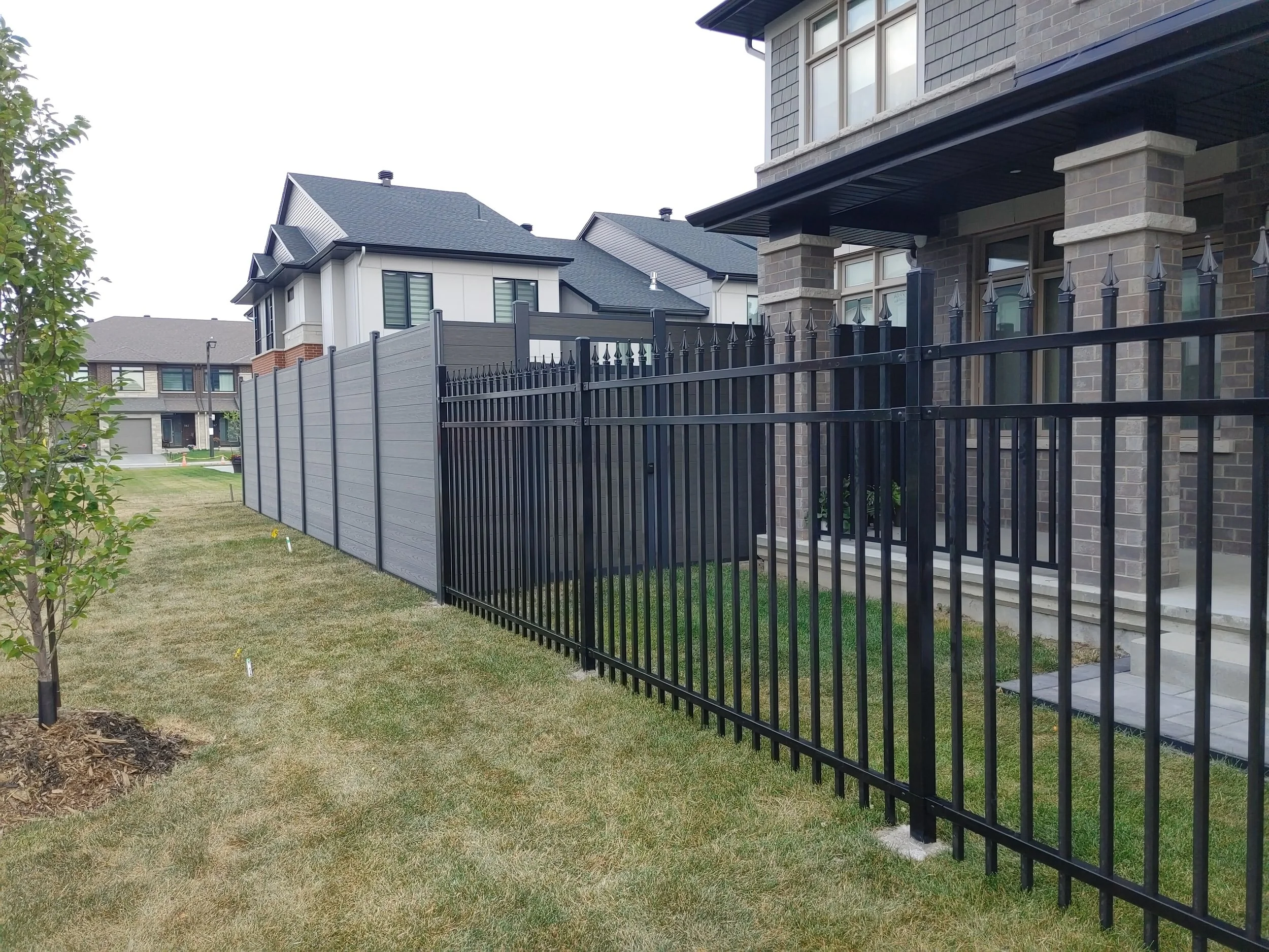 Dark Grey WPC/Iron Fence in Stittsville, 2025. StandArt Fence 