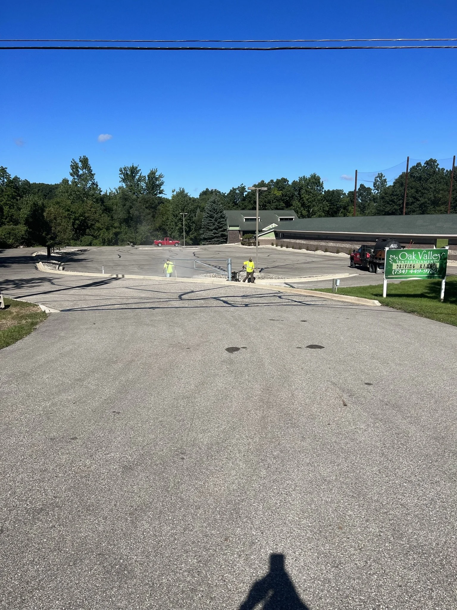 Before sealcoating and striping