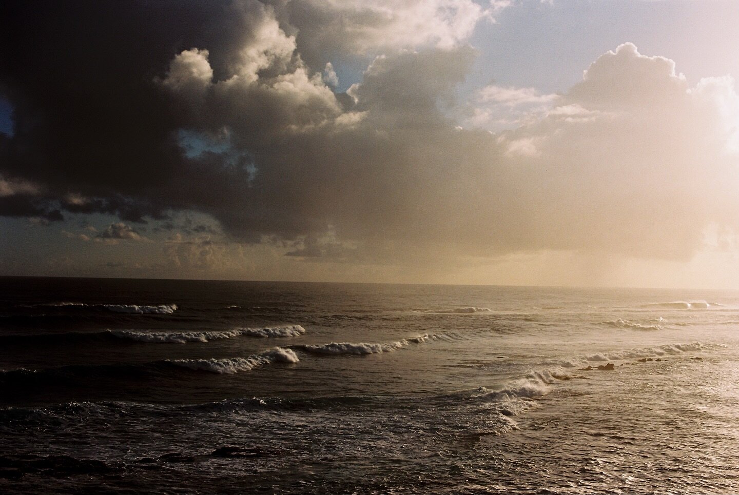 Last year around this time I went to Puerto Rico and after dropping my mom and grandmother off at the airport at 4:30am, I walked 3 miles around old San Juan and watched the sunrise from the coast. This is one of the film images (scanned by @thefindl