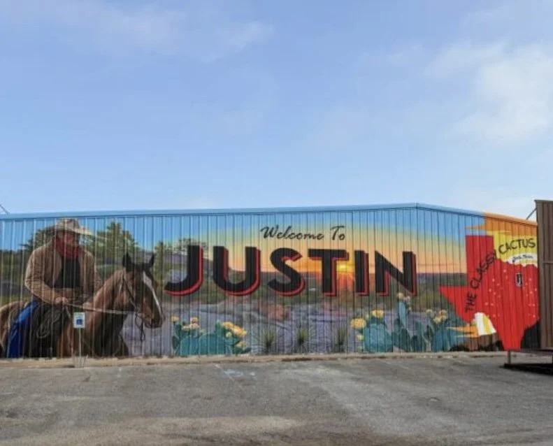 Mural on side of building in Justin, TX
