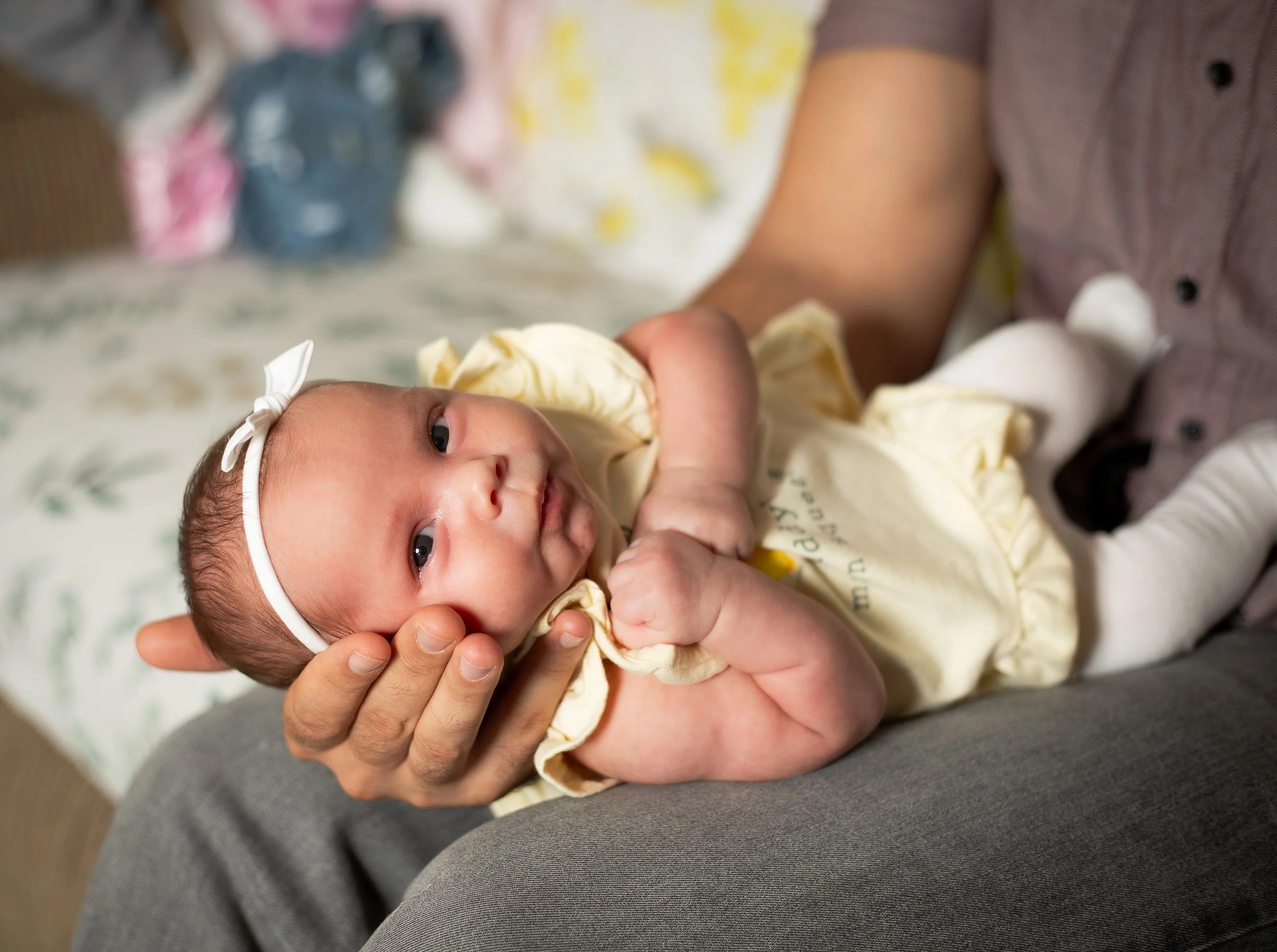 3 week old baby portraits, in home session by family photographer in the high desert area.