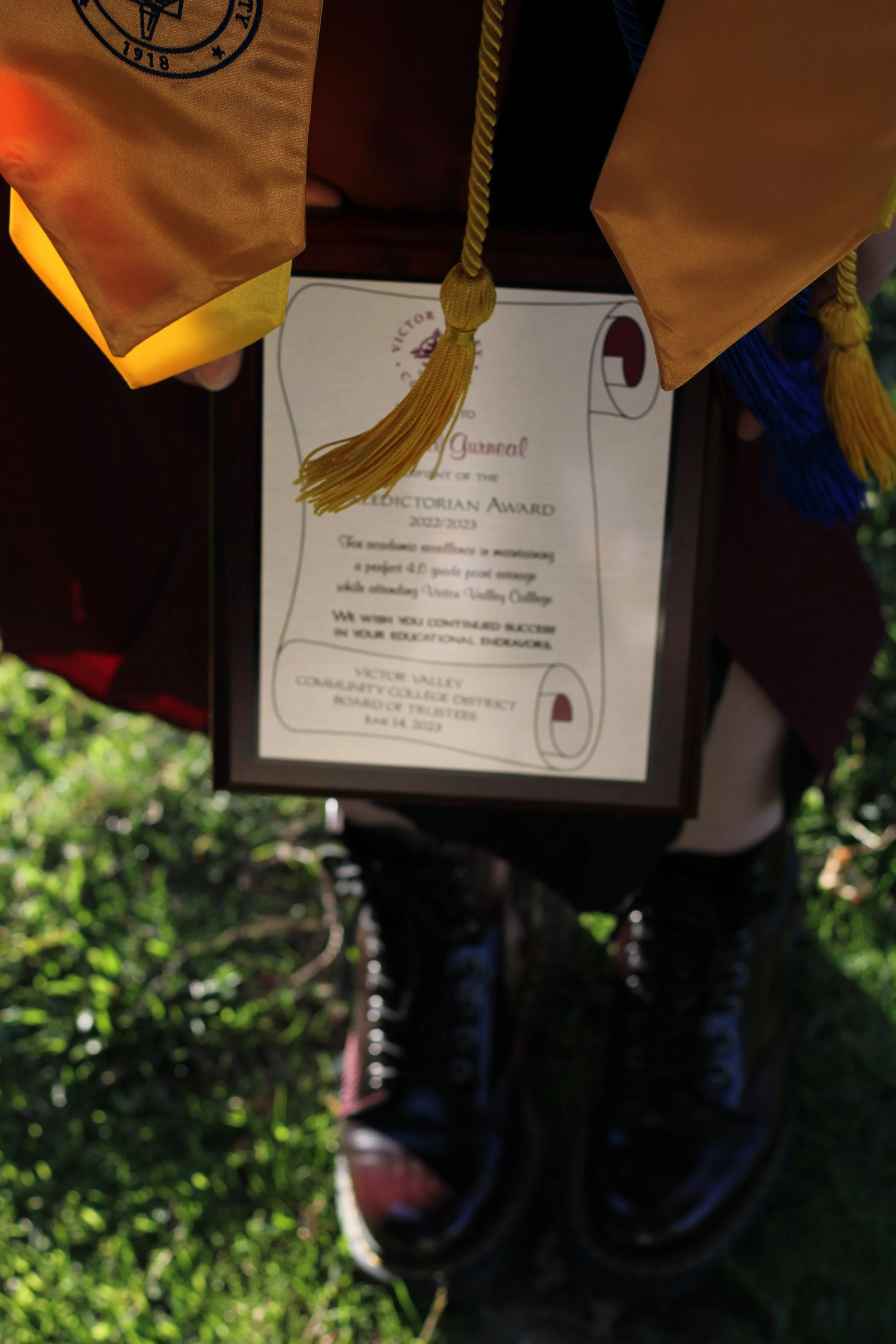 Graduation diploma with tassel and doc martins,VVC graduation photo. 