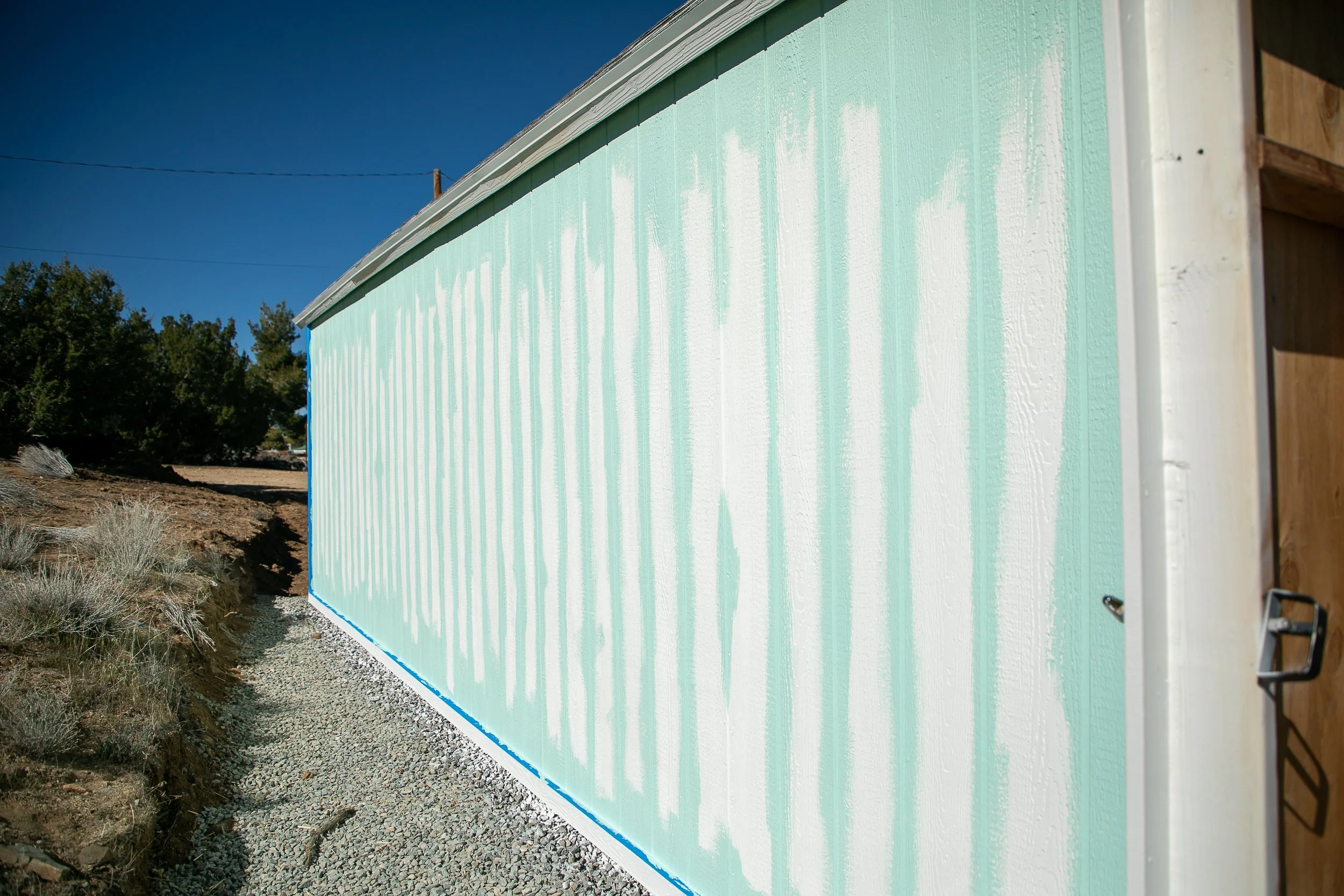 How to paint a backyard shed.