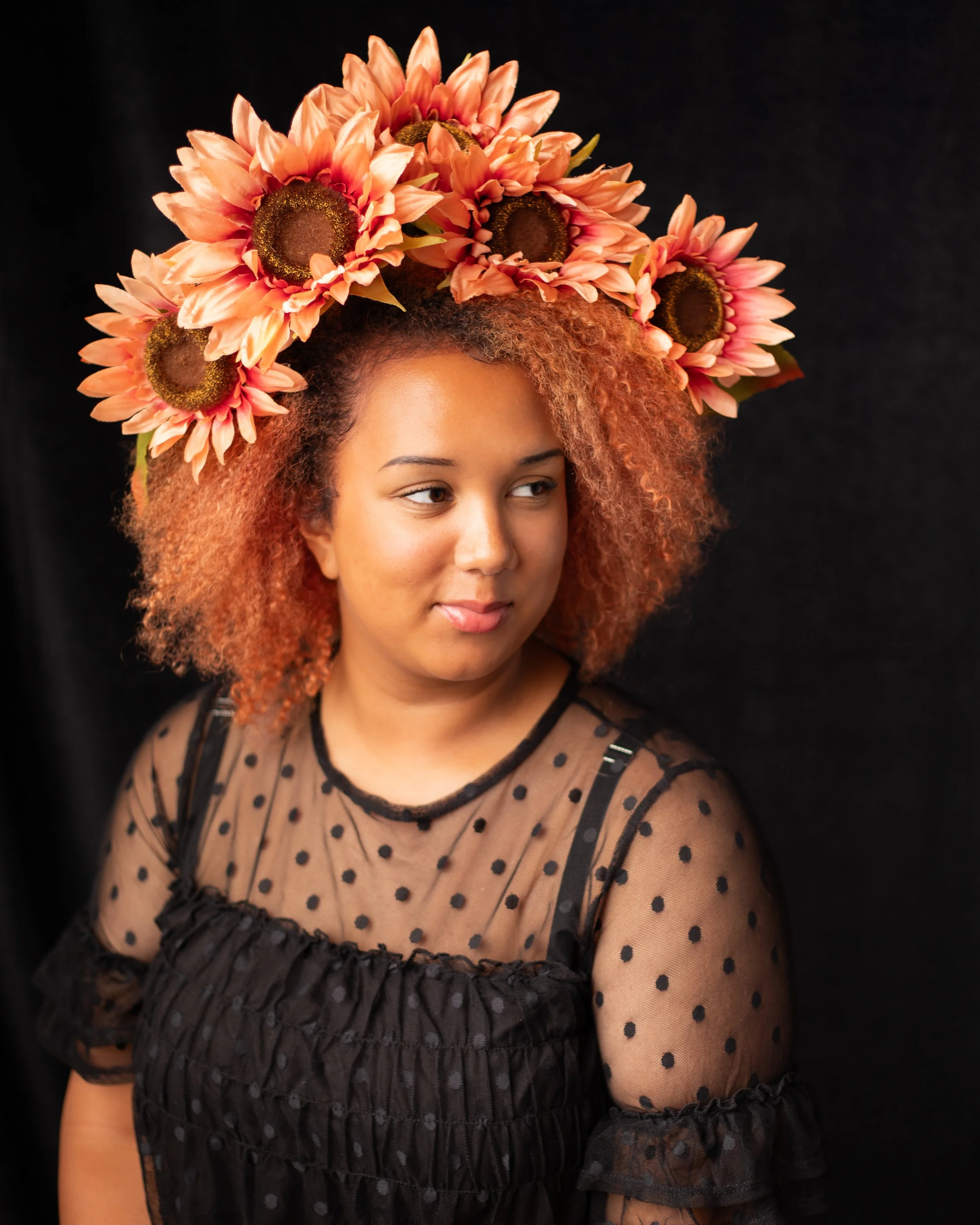 girl with sunflowers in hair