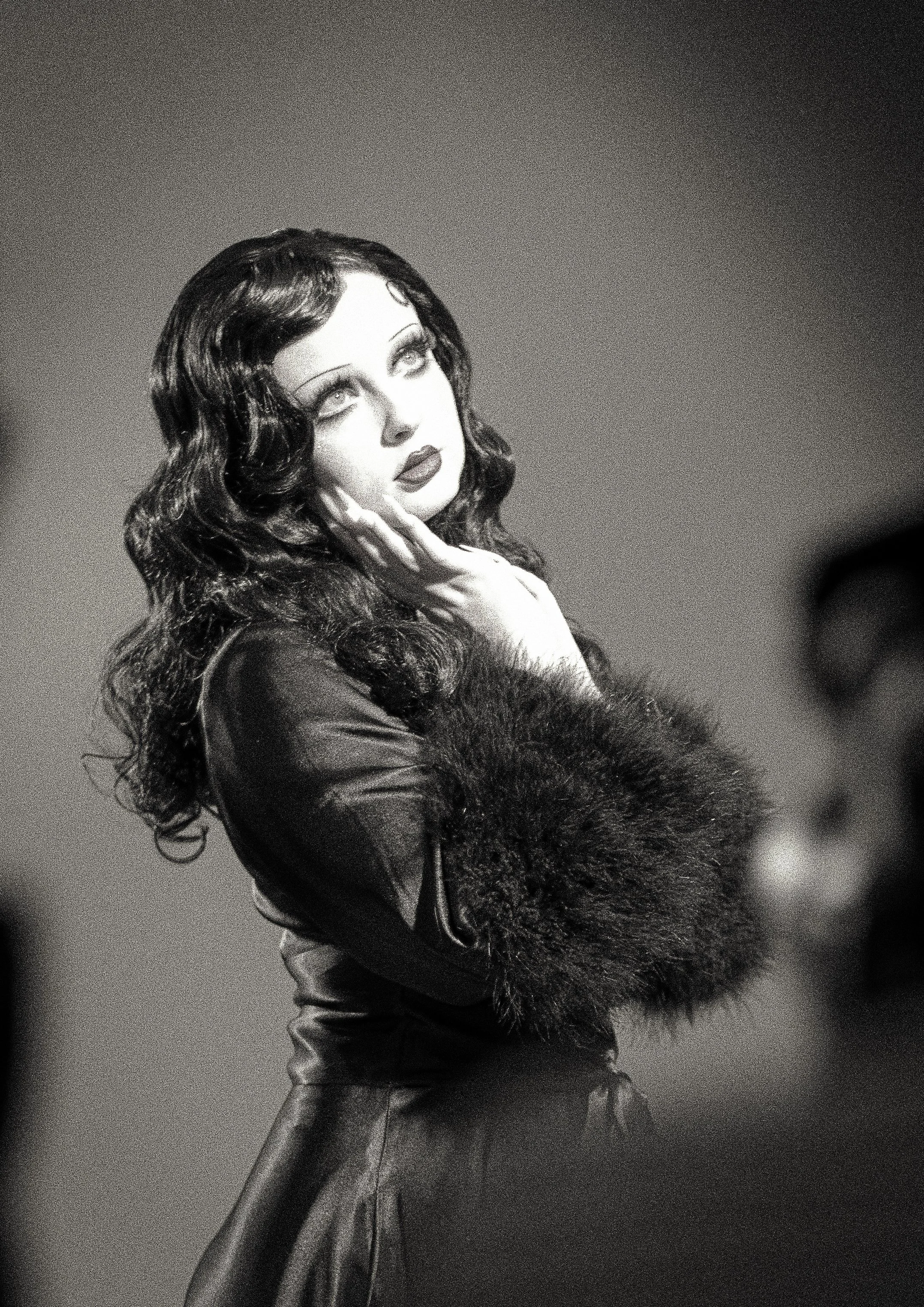 Film noir type photo session with a vintage feel by pinon hills photographer. Photo done in studio and added grain in photoshop.