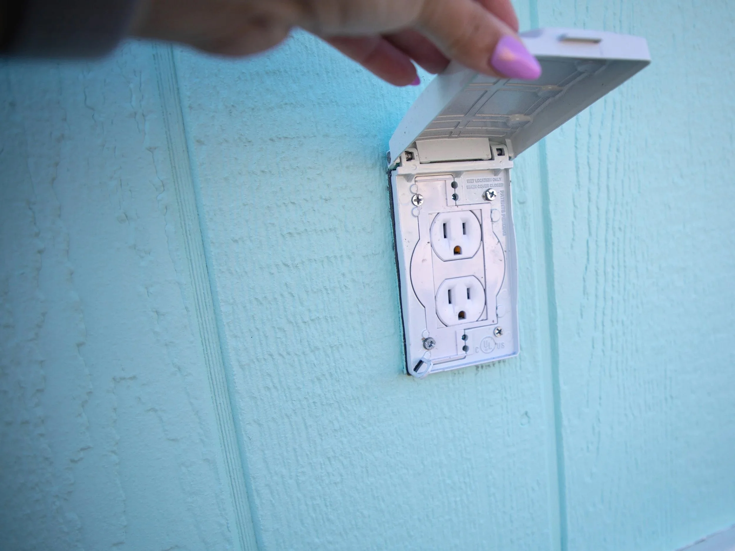 Outlets for the exterior of a studio are great in case you want to display christmas lights or need to plug in anything else. Photo studio in high desert.