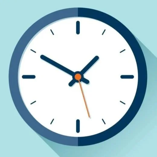 Round wall clock showing 10:47 with a light blue background.