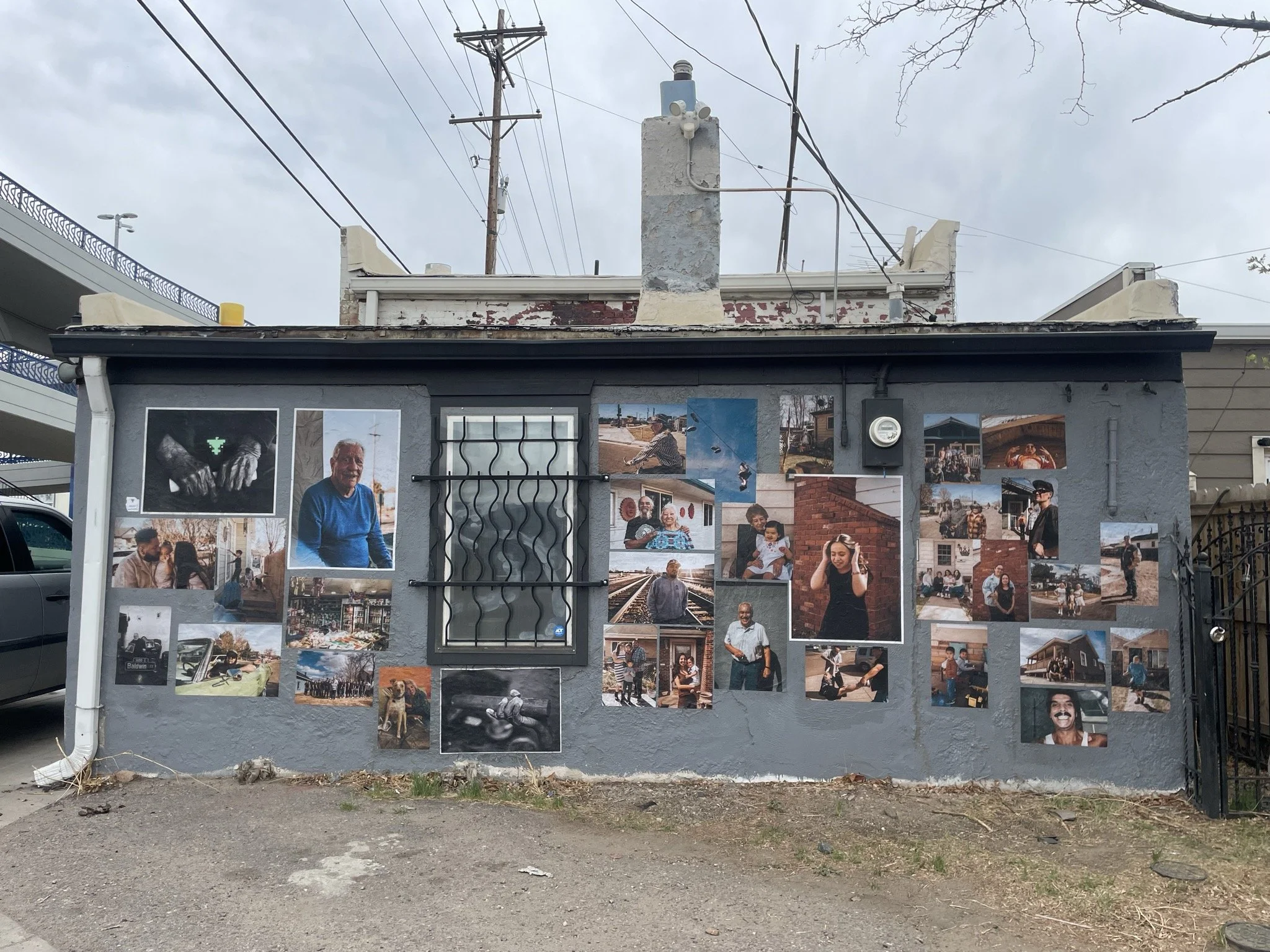 Mural wall with photographs of people