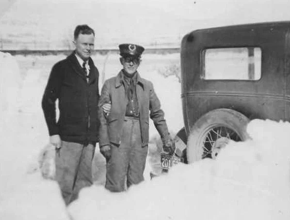 William on his mail route in the snow with his son, Heber. Date unknown.