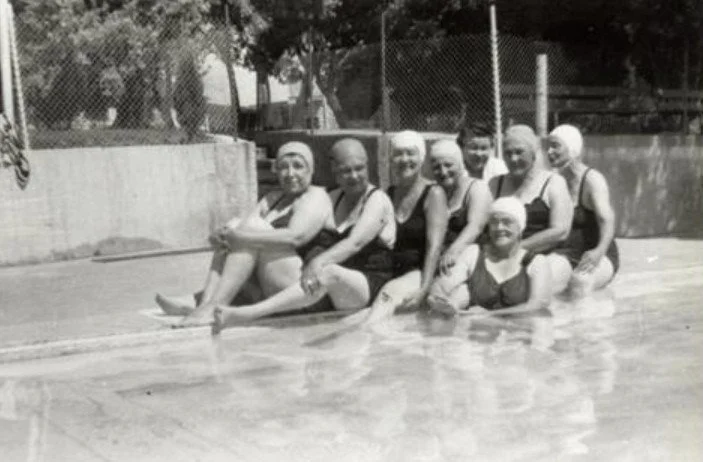 A black and white photograph of eight women at Saratoga Resort. Photo courtesy of Jean Gordon. Date unknown.
