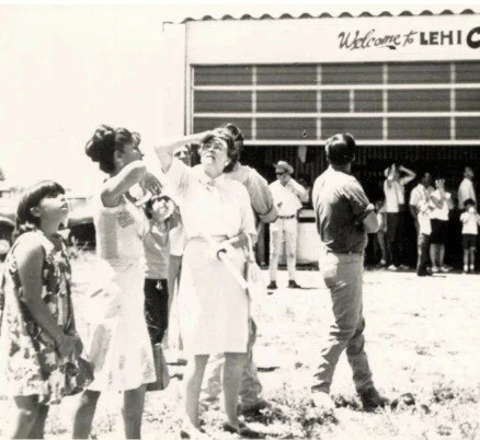 Onlookers look to the sky during the “fly-in” under the reopening of the airport under AA Aviation in 1967.  Photo from Lehi Historical Society.