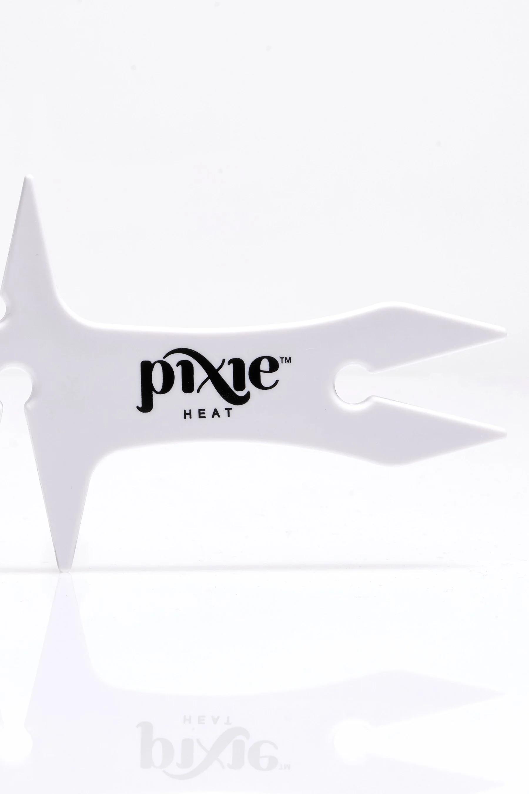 Rake comb for pixie hair cuts.
