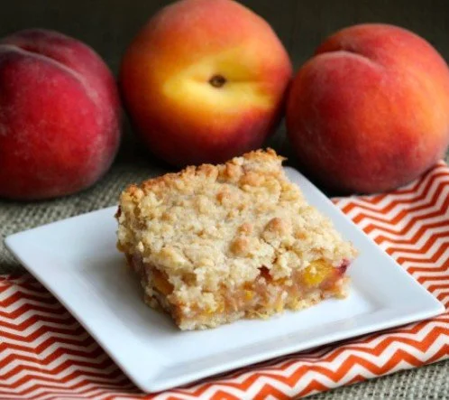 Is the cold getting you down? Are the snowdrops giving you just the faintest glimmer of hope that warm weather will someday return? Well Chef Kara will have a special treat for you tomorrow to warm you right up - peach ginger crumble bars!

Enjoy the