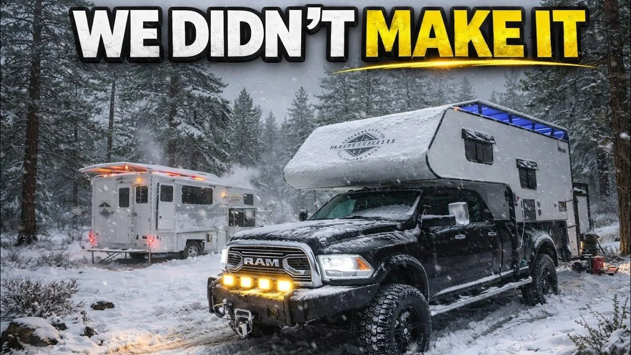 A snowy forest scene with a black pickup truck towing a large RV and a smaller RV in the background. The text at the top reads, "WE DIDN'T MAKE IT," with "MAKE IT" highlighted in yellow.