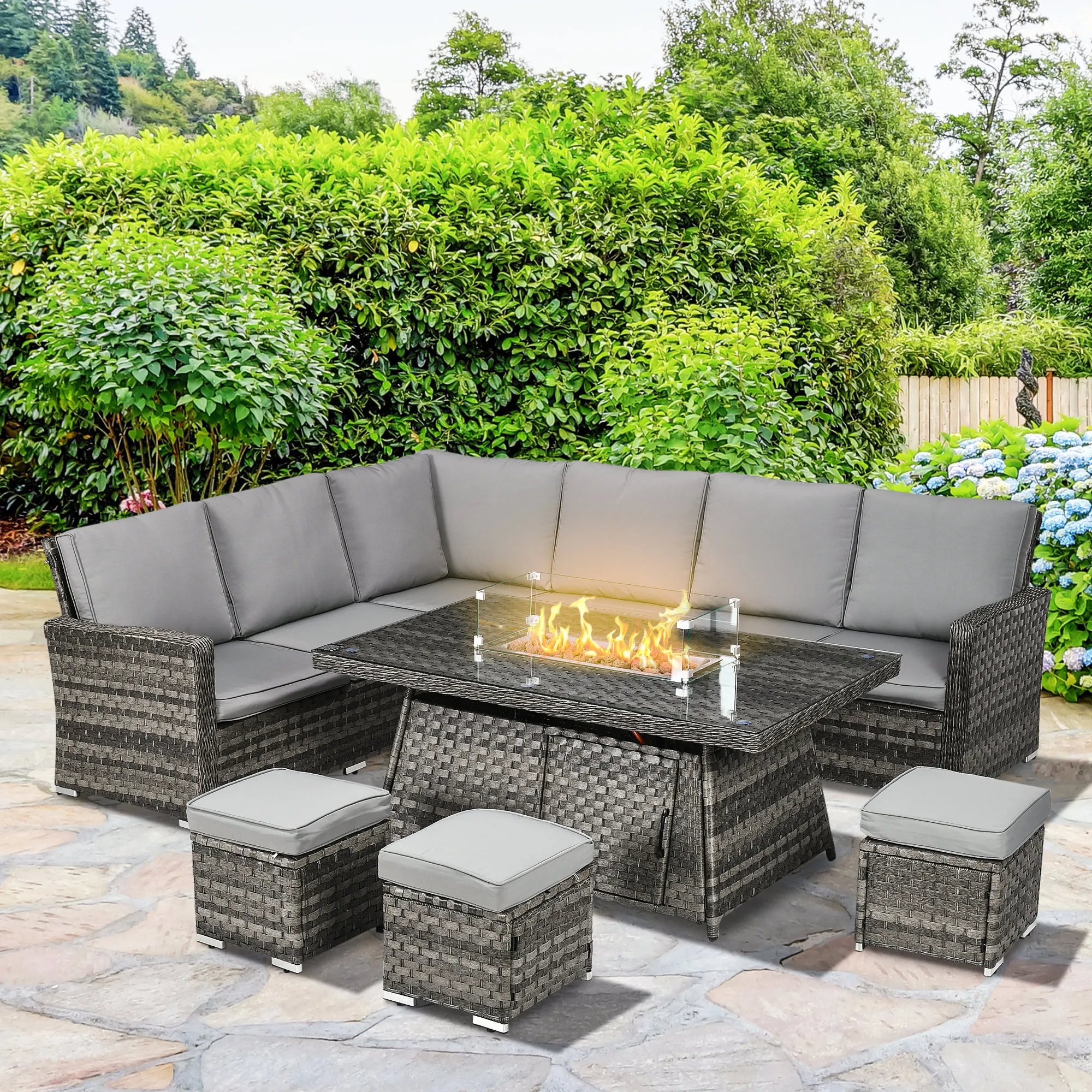 The Haven Fire Lounge grey rattan garden furniture set with fire pit table and cushioned seating