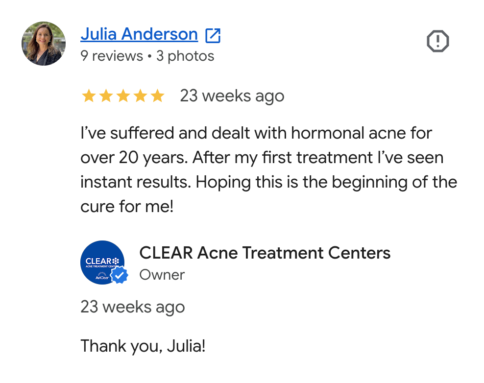 Screenshot of a Google review from Julia Anderson, praising CLEAR Acne Treatment Centers for effective hormonal acne treatment over 20 years, with a five-star rating and a reply from the clinic owner.