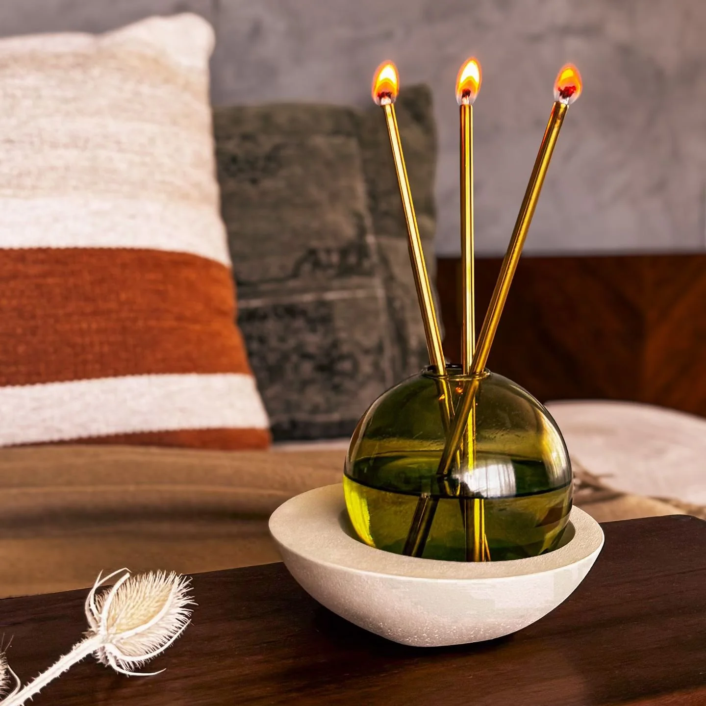 Our Hibachi Candle is a sophisticated and sustainable addition to any home. This unique candle features a refillable round glass with a base for a secure fit. Enjoy the luxurious stainless steel candle sticks that never melt, offering endless clean-b