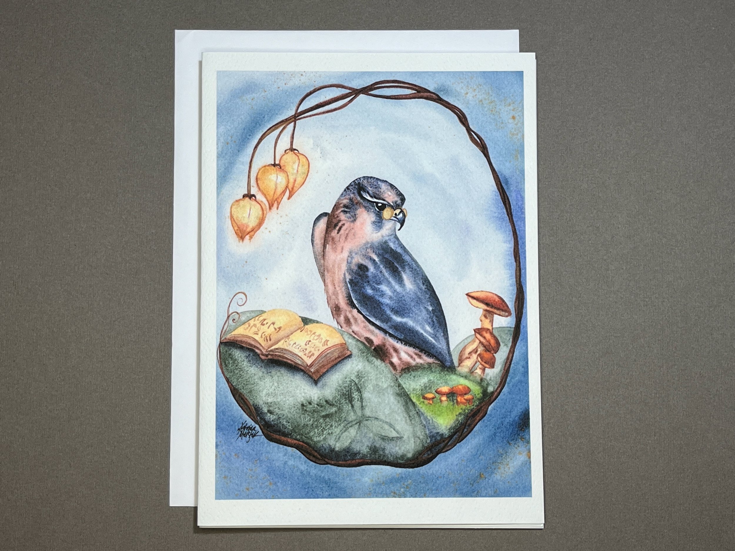 Katrina's-Cards-Merlin-A7-notecard-watercolor-fantasy-wizard-bird-mushroom-magic-book.jpeg
