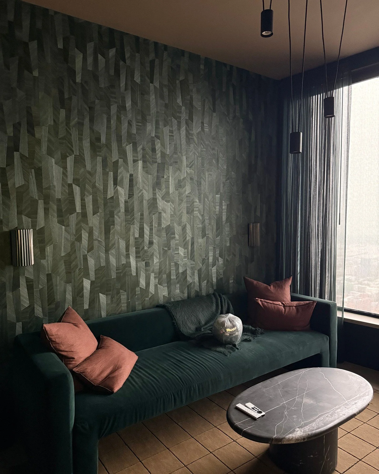 // DRAMA - small but mighty rooms can take a lot of personality - for this media room, we made no exception - dark green, tan &amp; flashes of color make this media room cozy yet fun - it doubles as a vinyl listening room during evening parties - des