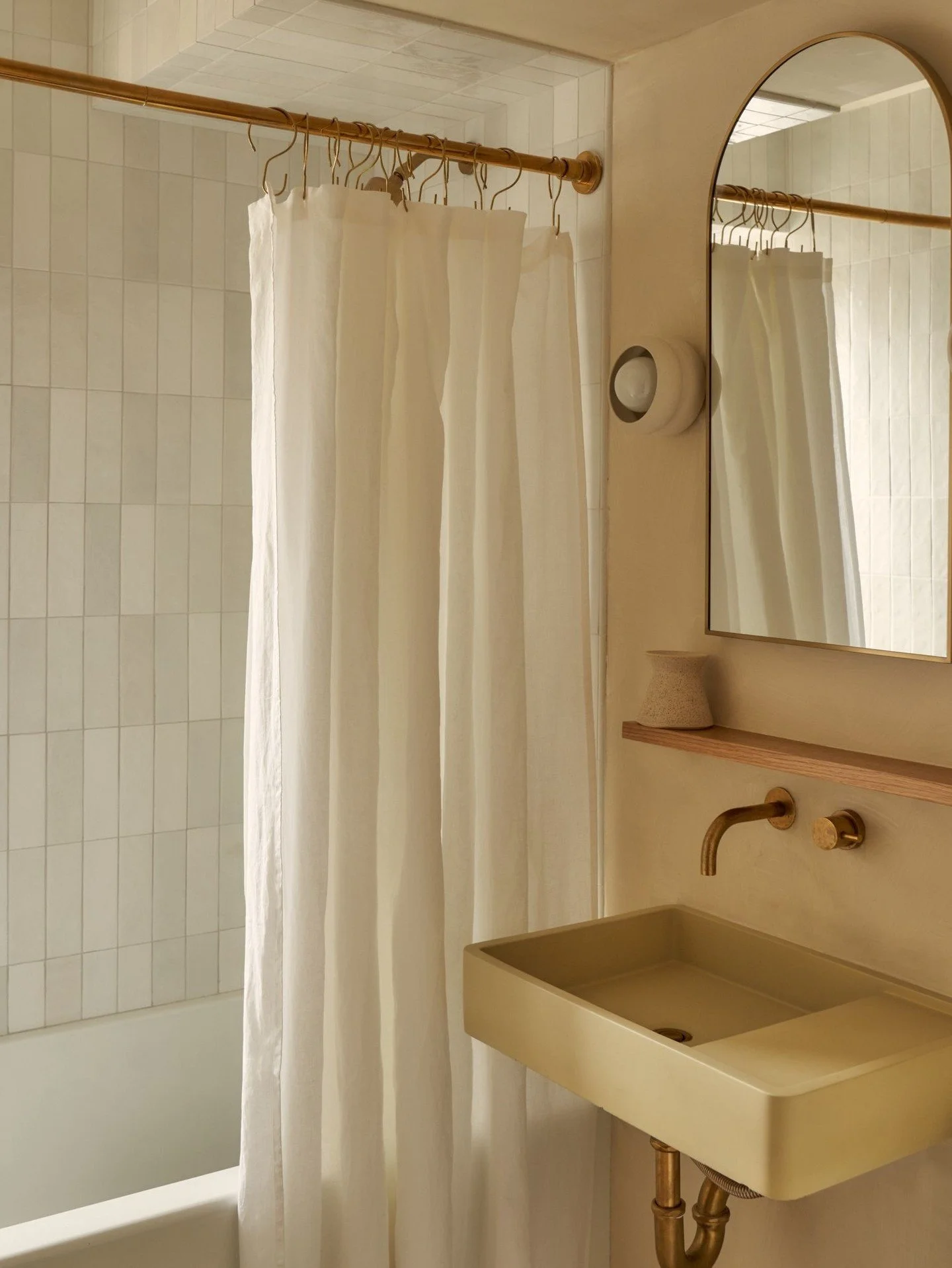 // REFLECTIONS - a collection of our favorite powder rooms &amp; baths - warm neutrals, curved mirrors, and modern fixtures that we can't get enough of - proof that the smallest rooms deserve just as much attention as the rest of the home - design by