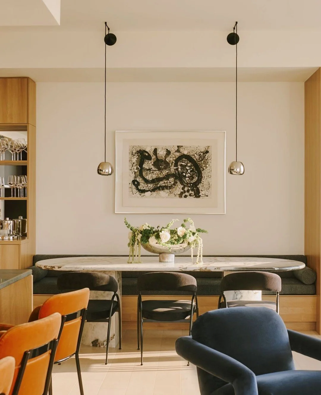 // GATHER - we built the dining room in our downtown brooklyn penthouse around long dinners &amp; good conversation - a statement art piece, sculptural pendants &amp; chairs with just the right amount of personality - photography by @sethcaplan - des
