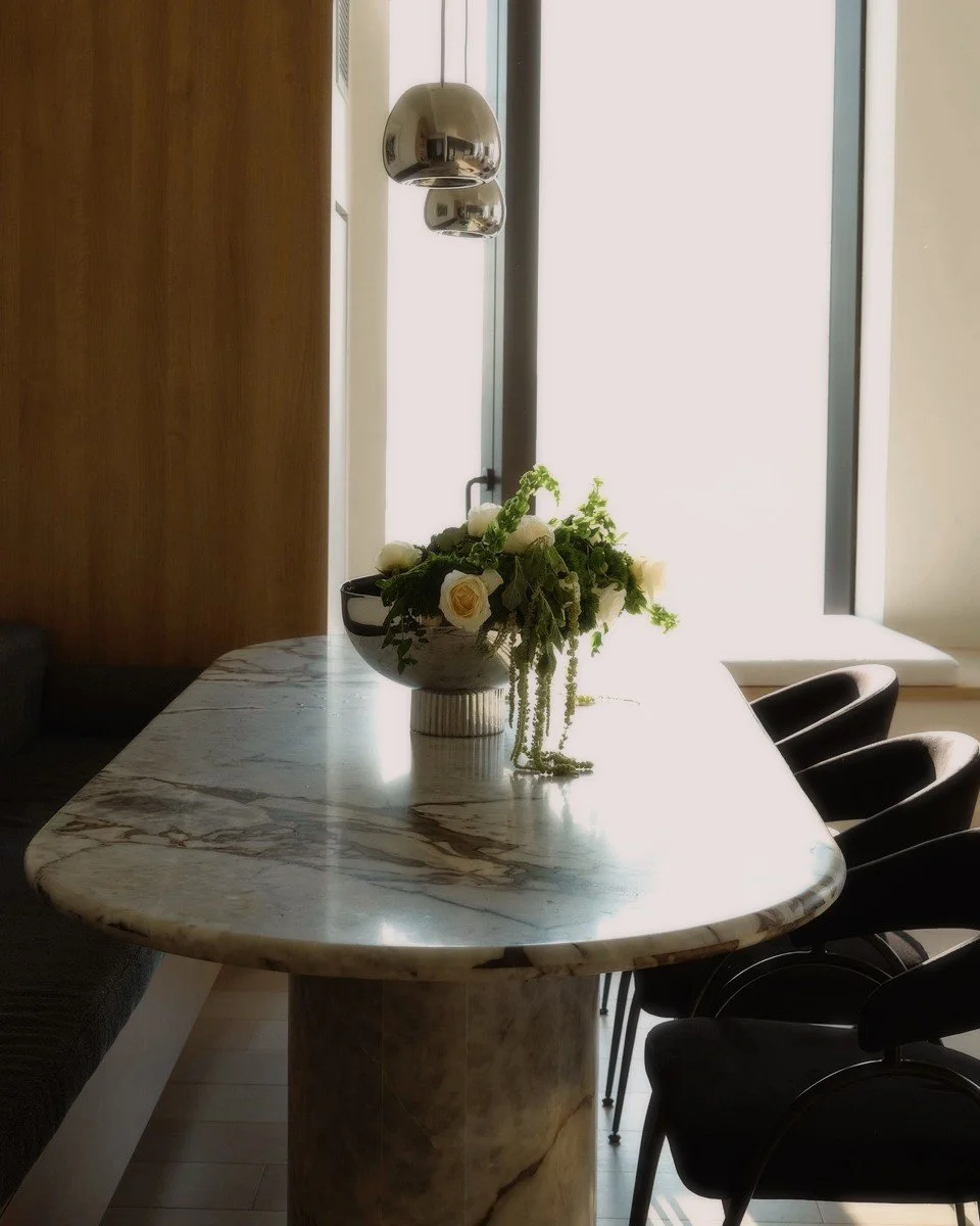 // GOLDEN HOUR - the dining table in our downtown Brooklyn penthouse was designed for good company - a stunning marble table, a custom banquette &amp; a sunset that makes you want to stay all night long - interior design &amp; styling by #clairehungd