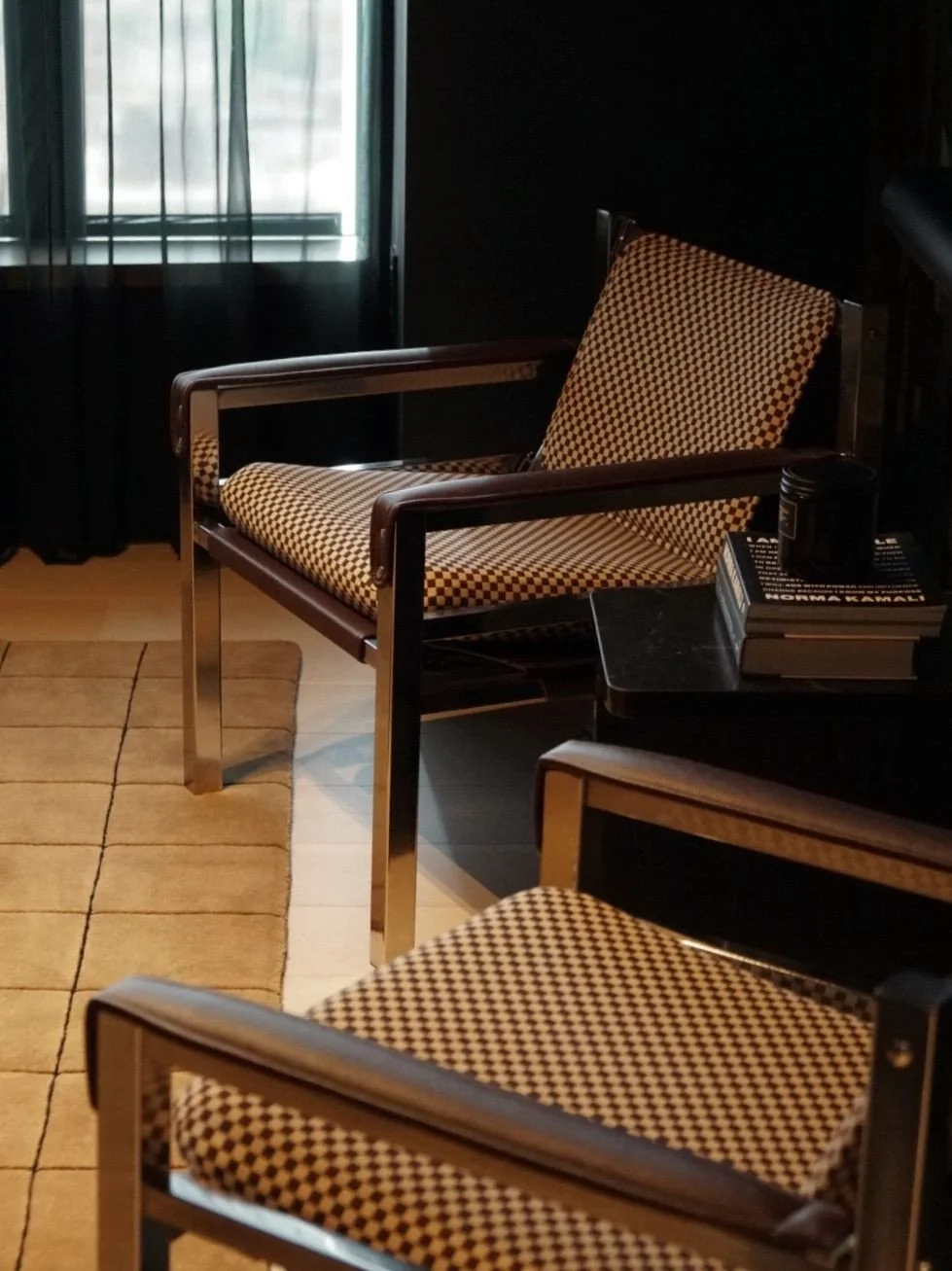 // MOMENTS - more from the media room in our downtown brooklyn penthouse - checkered lounge chairs, arched built-ins with a record player tucked inside &amp; a view that makes the dark palette feel even moodier - design by #clairehungdesign ⁠
⁠
&bull