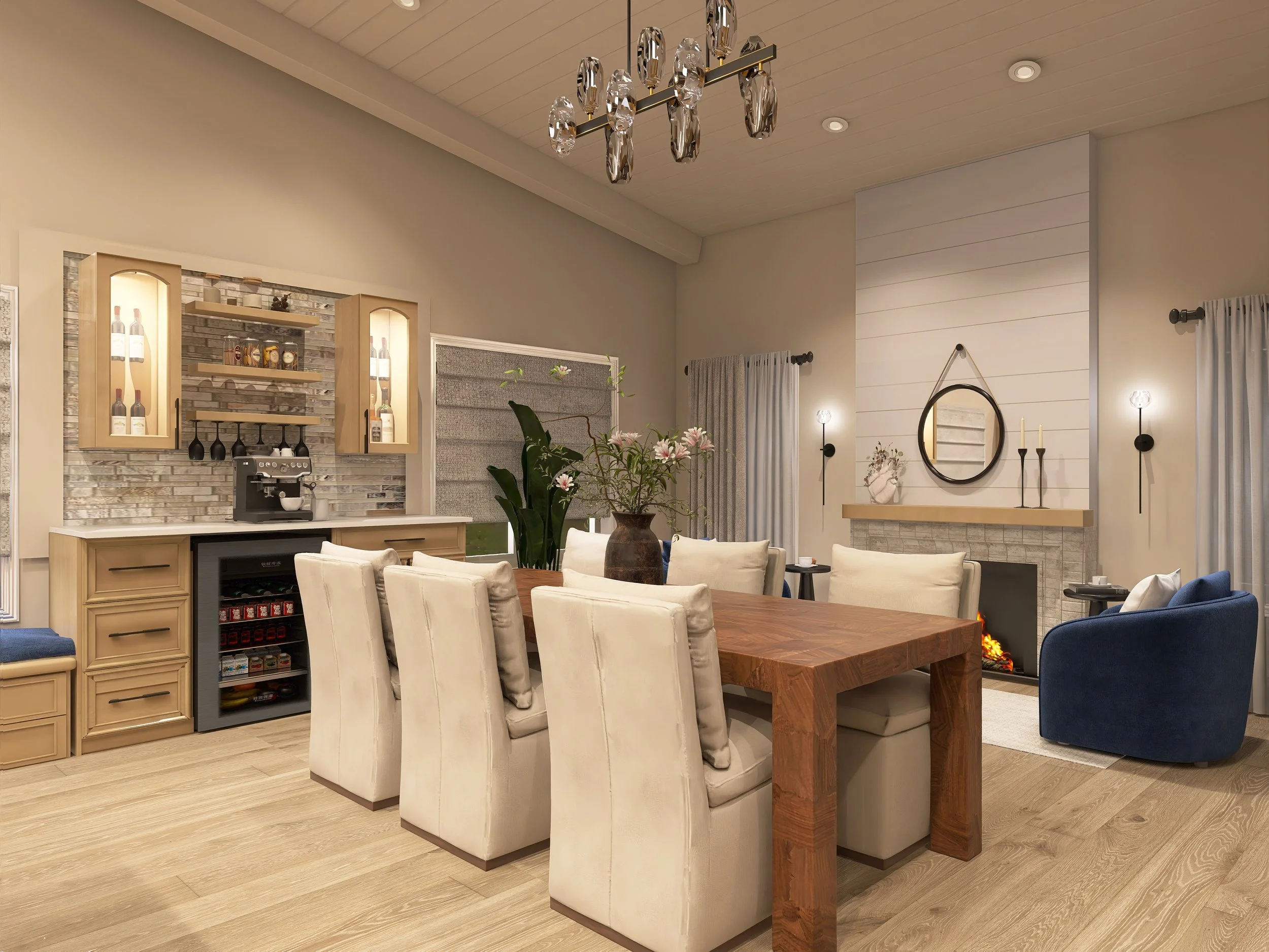 A cozy dining room with a large wooden table, upholstered chairs, a fireplace, modern light fixtures, and a bar area with bottles and a coffee machine.