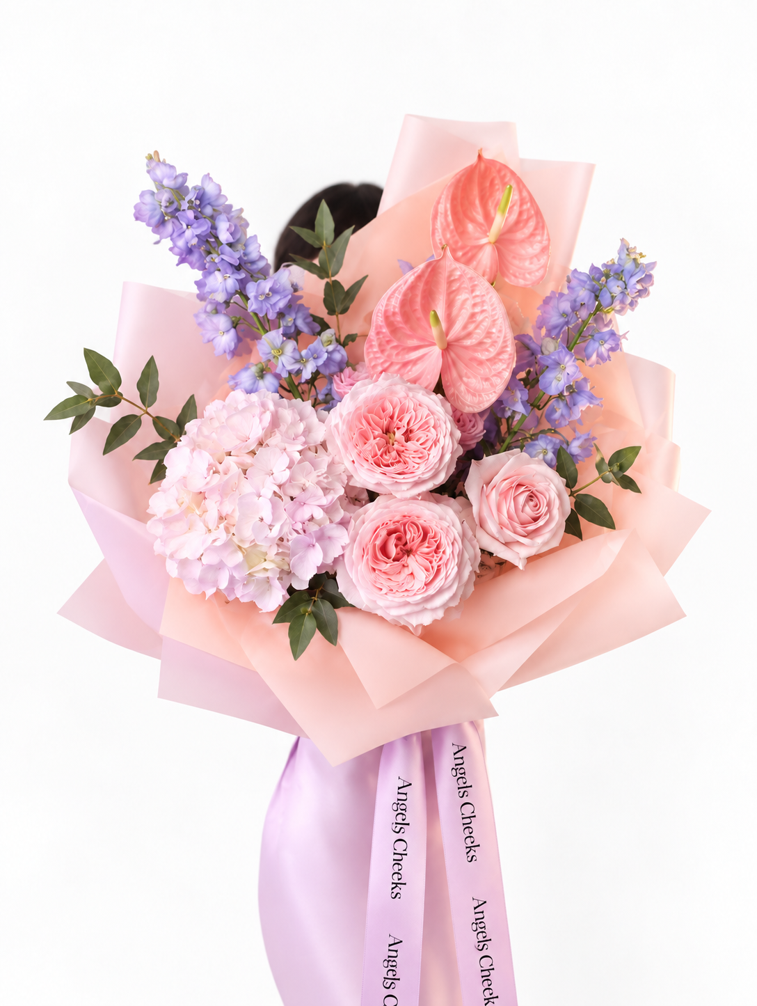 Pink garden roses, pink hydrangea, pink anthurium and lavender delphinium bouquet with purple ribbon, Chicago florist