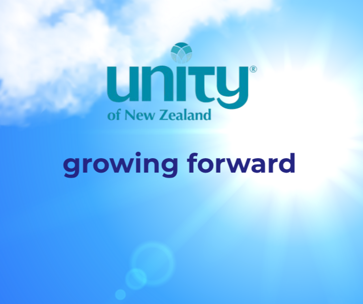 'Unity of NZ growing forward' - words against a sunny blue sky.