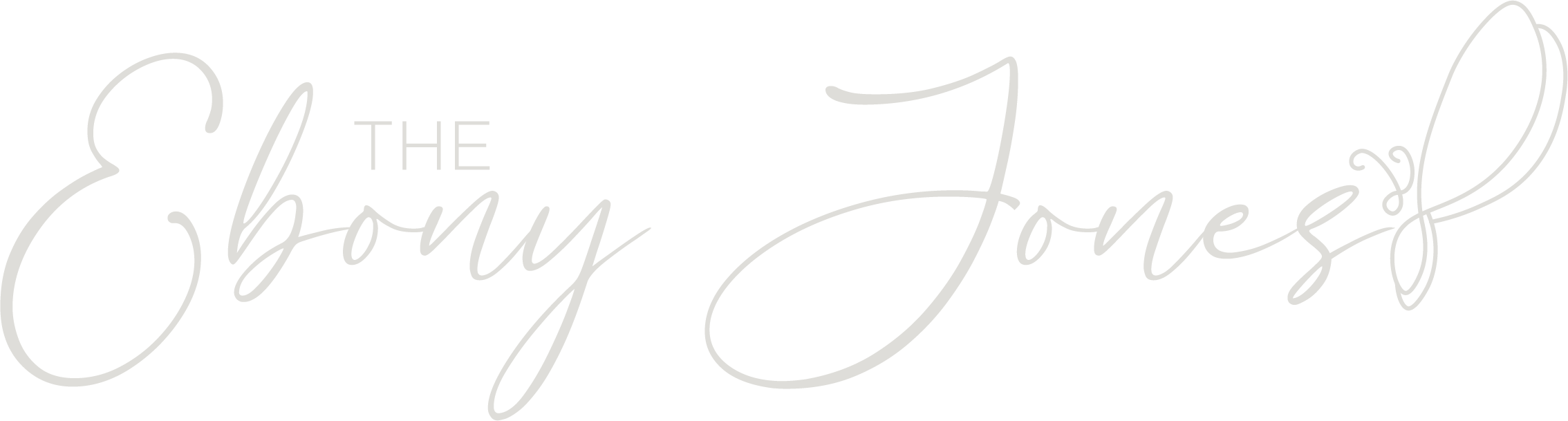 Elegant white calligraphy reading “The Glory of Love” on a black background