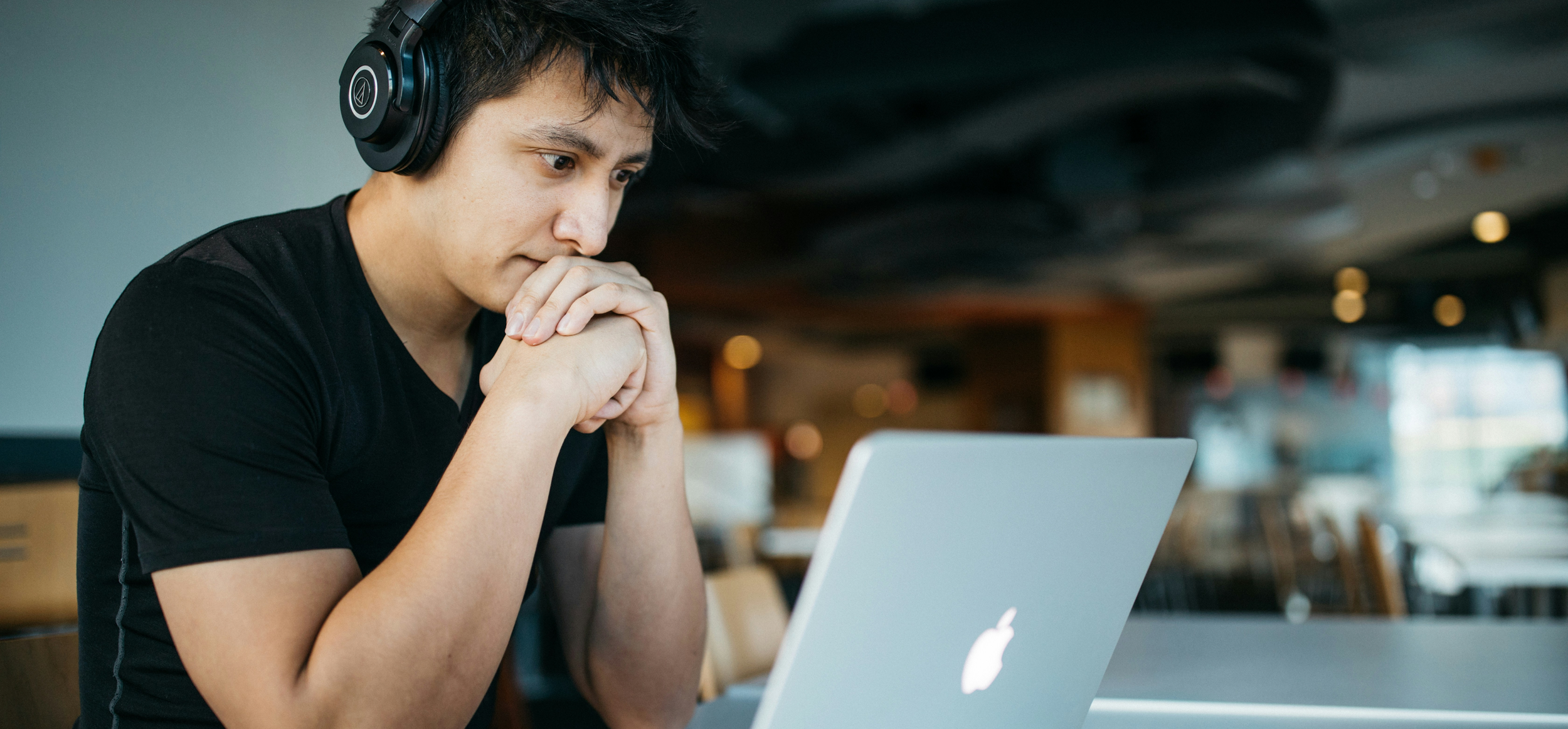 Man in front of a laptop