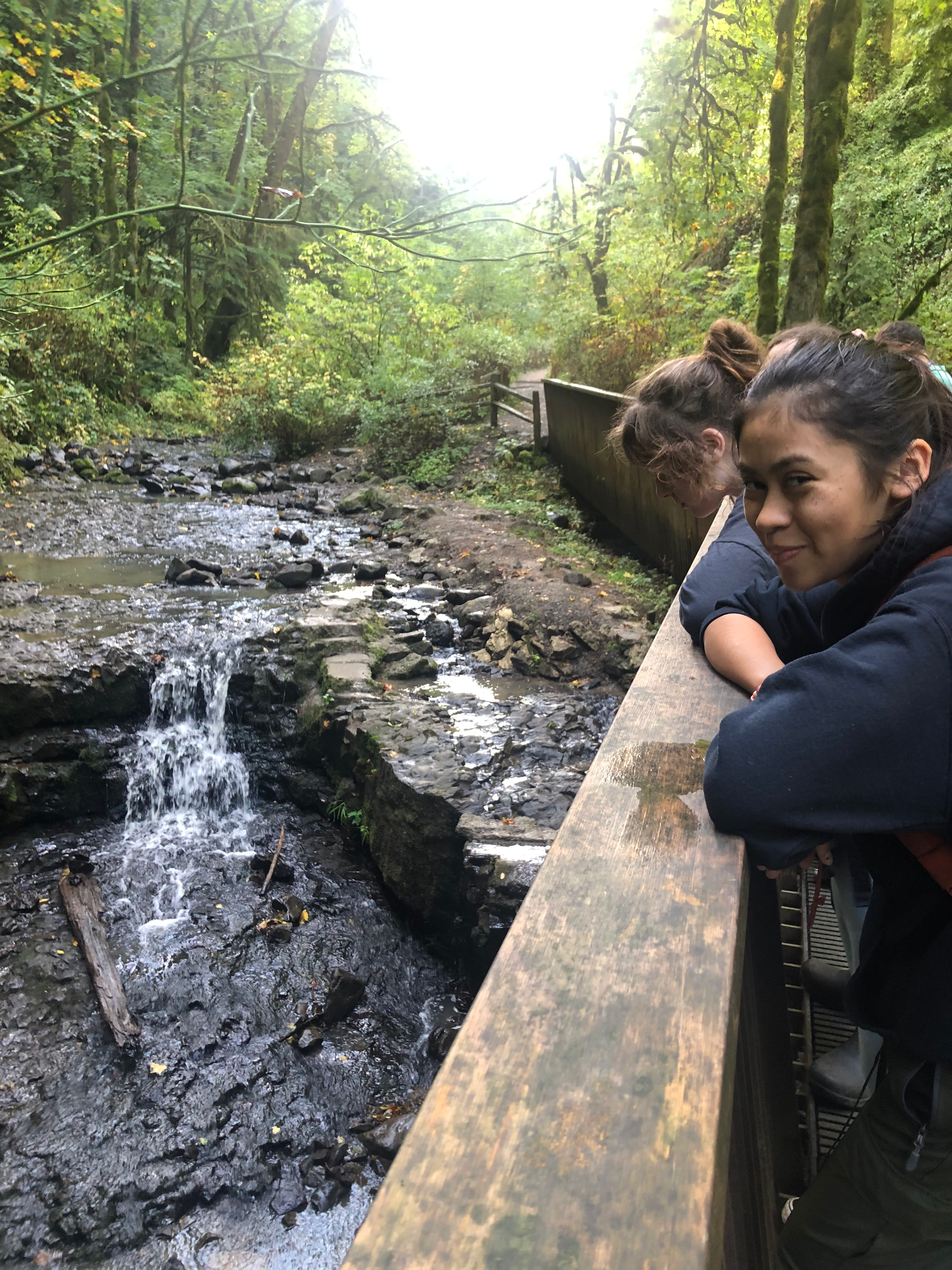 Forest school middle school student enjoying the outdoors at private school: The Portland Forest School in Portland, OR. Low ratio. Open enrollment. Multiage class, nontraditional school, alternative school, community based for K-8th grades