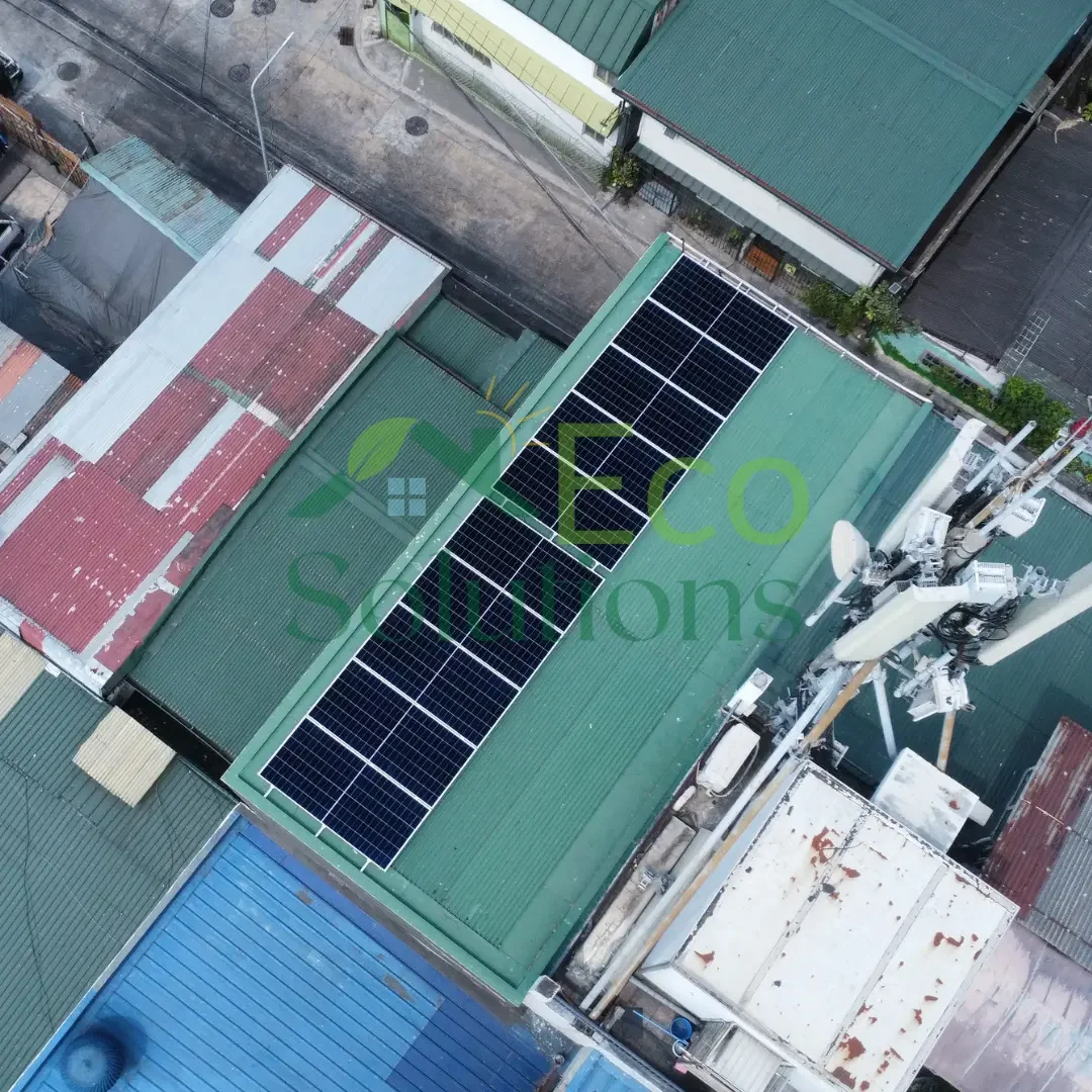An angled drone perspective showing the array orientation, confirming optimal sunlight capture for the Pasay location.