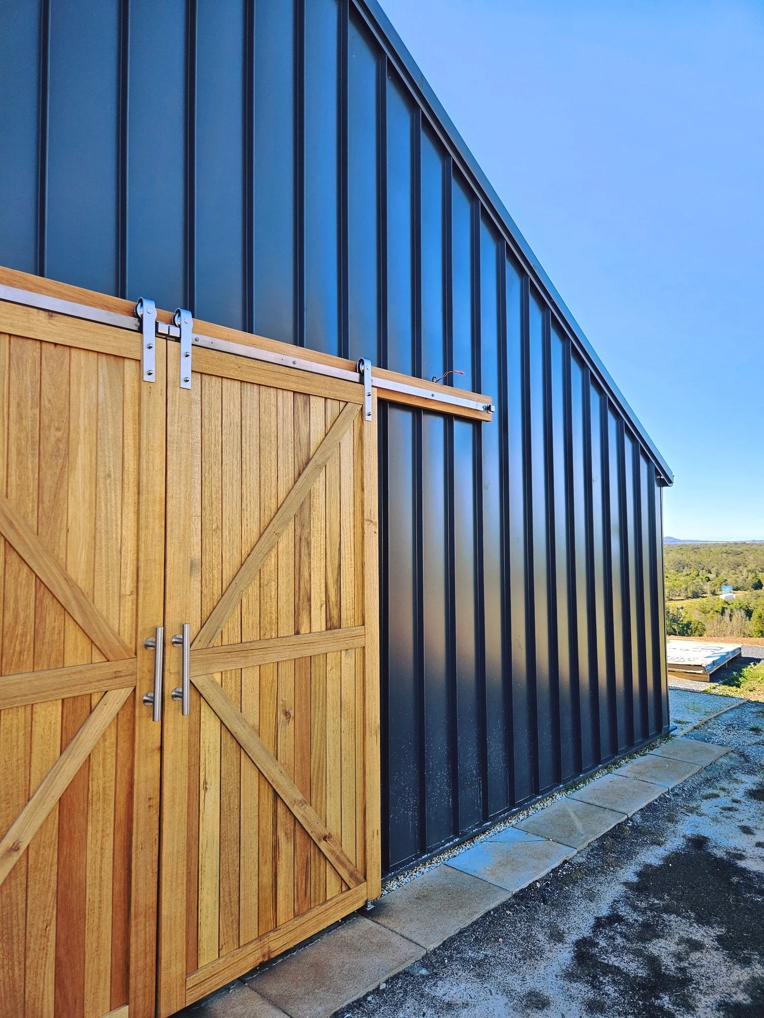 We love bespoke shed builds - and features like these custom timber doors that add warmth, texture, and impressive style. 

Small details like this can truly elevate the build. It's where function meets design.

📞 0499 191 900
📧 sales@jelconsheds.c