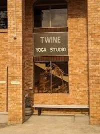 Photo of Twine Yoga studio from window and brick walls in Adamstown
