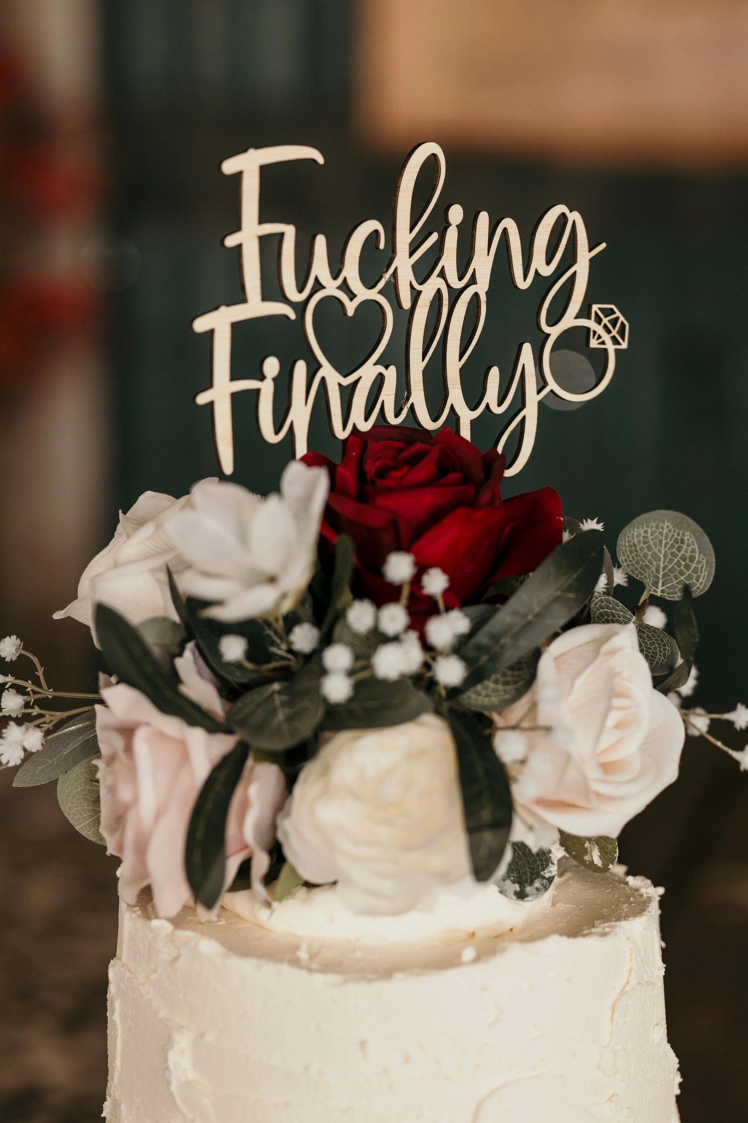 cake wedding topper with artificial flowers