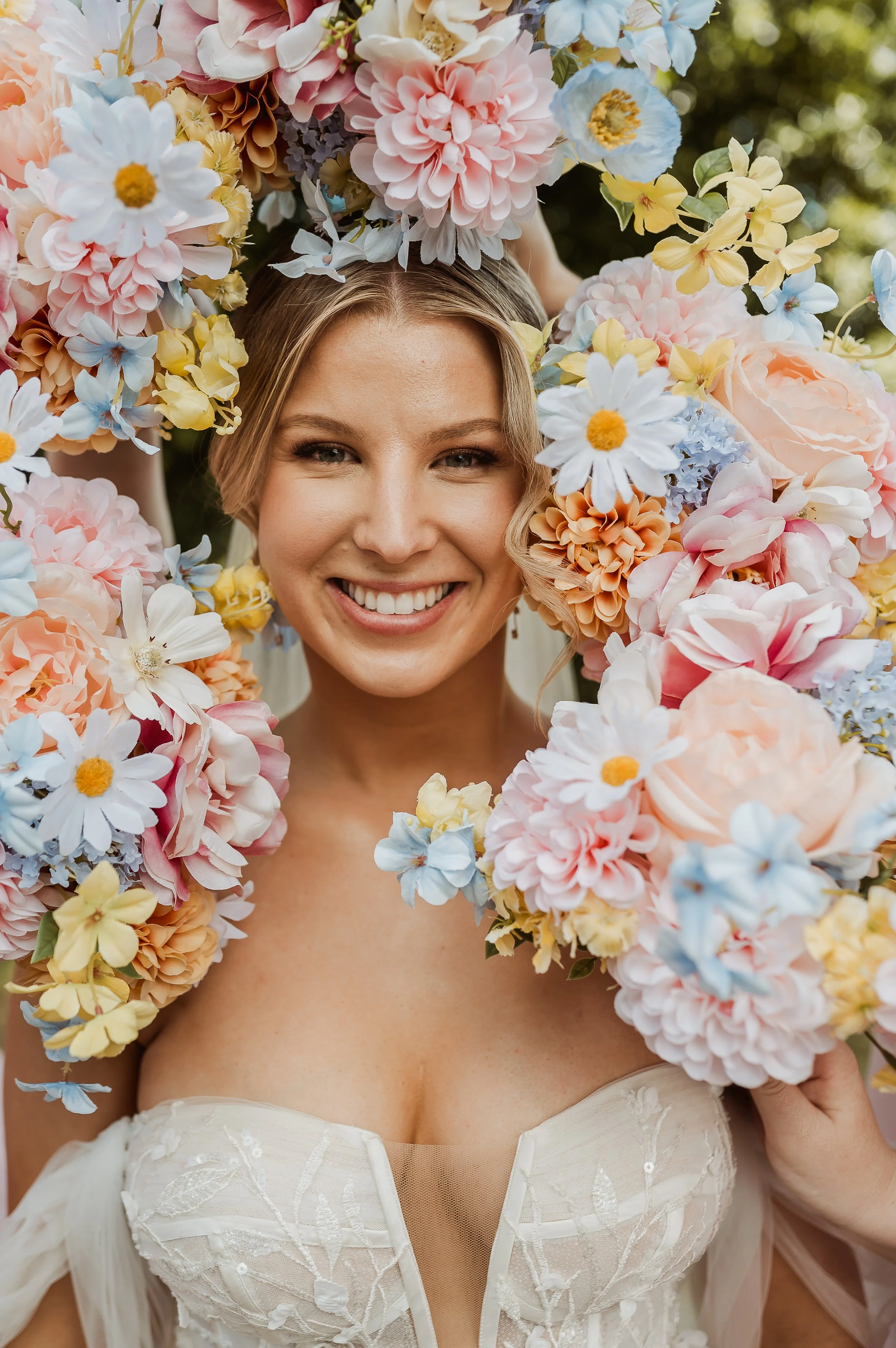 bridesmaids colorful bouquets surrounding bride