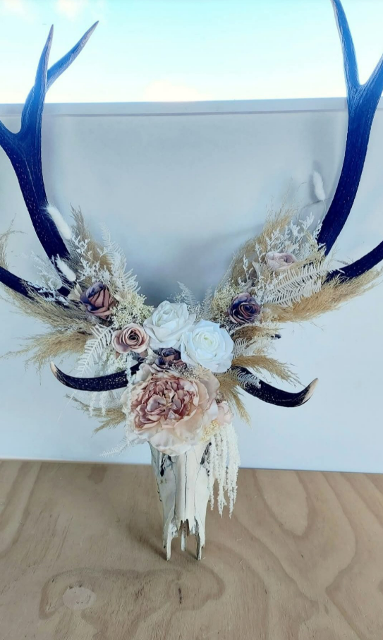 home decor with stag antlers and skull